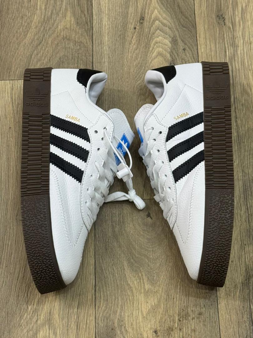 "ADIDAS SAMBA Leather Unisex Sneakers: Expertly crafted with premium leather, offering timeless style and comfort for both men and women. Perfect for casual and everyday wear."