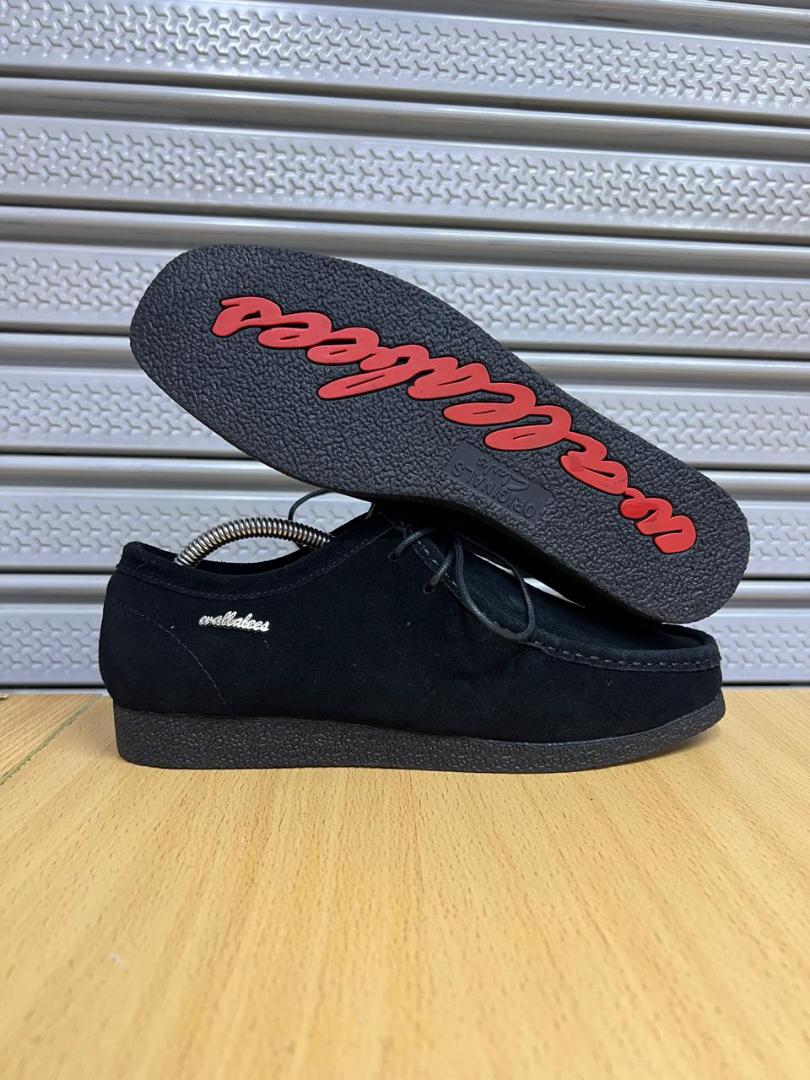 Clarks Wallabee Shoes – Timeless Comfort and Style"Description:Iconic Design: Features a classic moccasin-inspired silhouette for a unique, timeless look.Premium Material: Made from high-quality suede