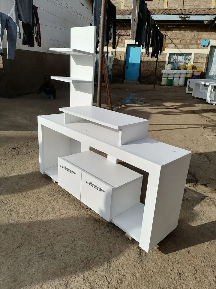 Media Consoles With Integrated Storage Neatly Organized And Display Media Equipment Like TVs, Gaming Consoles, And Sound Systems. They Feature Open Shelves, Closed Cabinets, And Drawers.