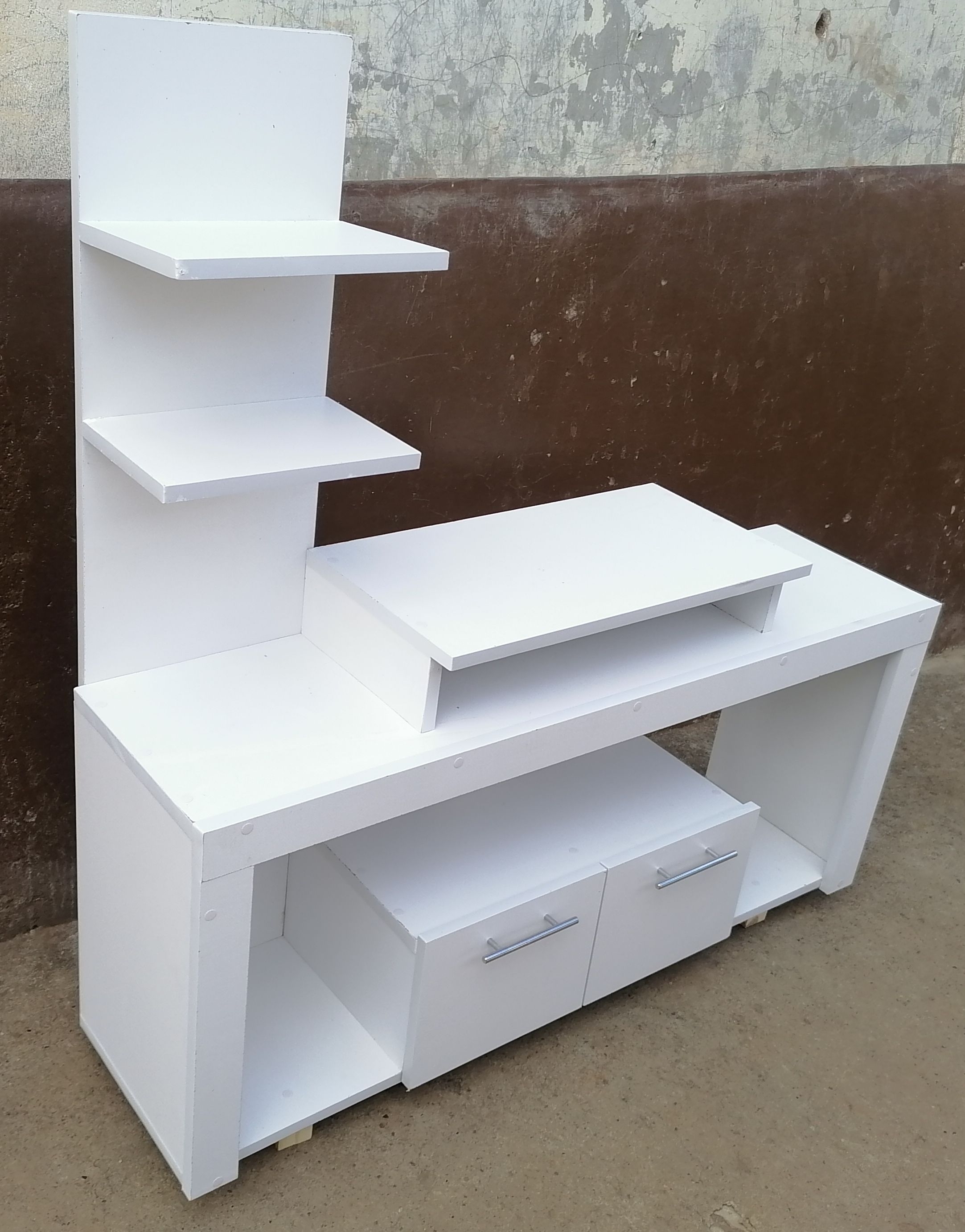 Media Consoles With Integrated Storage Neatly Organized And Display Media Equipment Like TVs, Gaming Consoles, And Sound Systems. They Feature Open Shelves, Closed Cabinets, And Drawers.