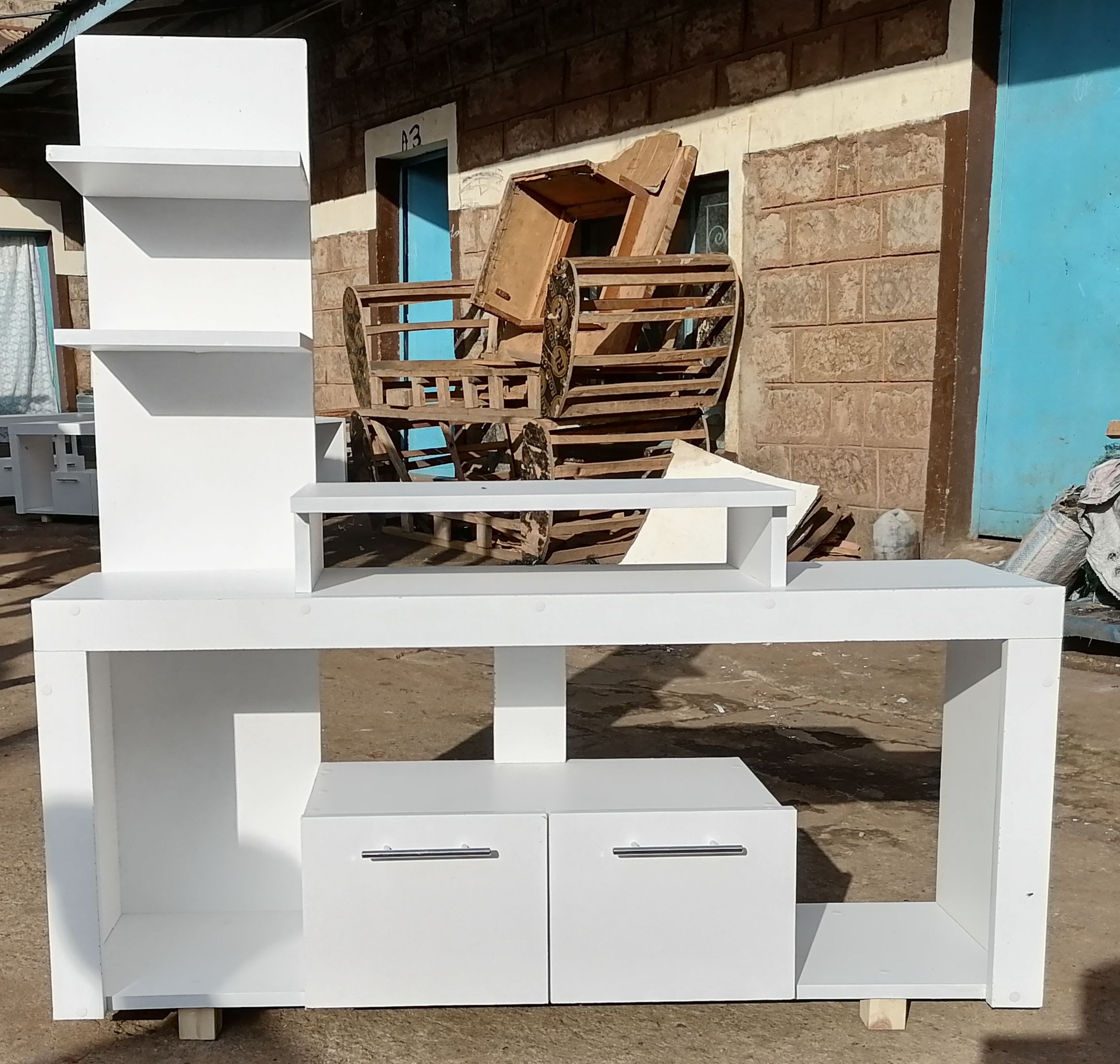 Media Consoles With Integrated Storage Neatly Organized And Display Media Equipment Like TVs, Gaming Consoles, And Sound Systems. They Feature Open Shelves, Closed Cabinets, And Drawers.