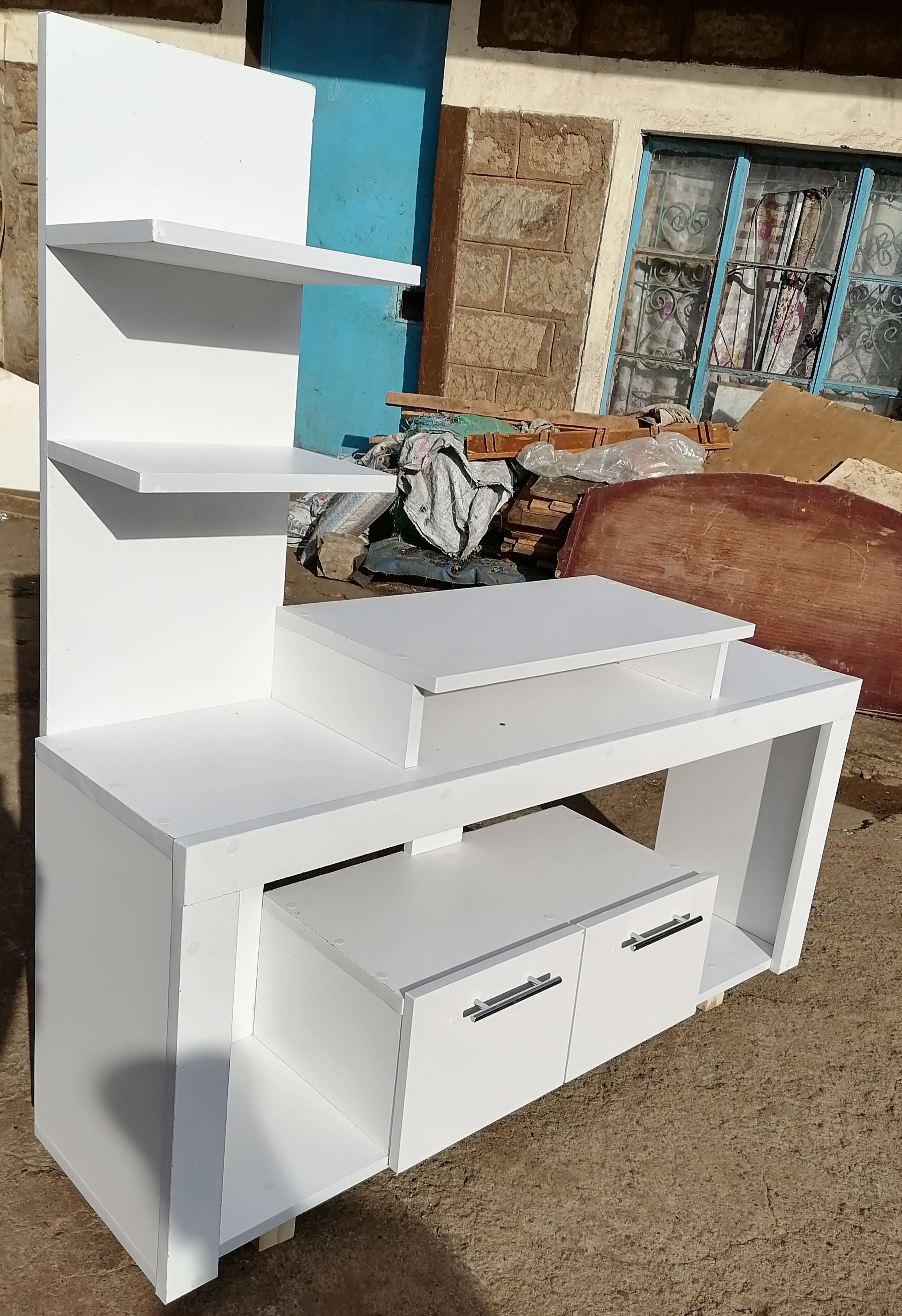 Media Consoles With Integrated Storage Neatly Organized And Display Media Equipment Like TVs, Gaming Consoles, And Sound Systems. They Feature Open Shelves, Closed Cabinets, And Drawers.
