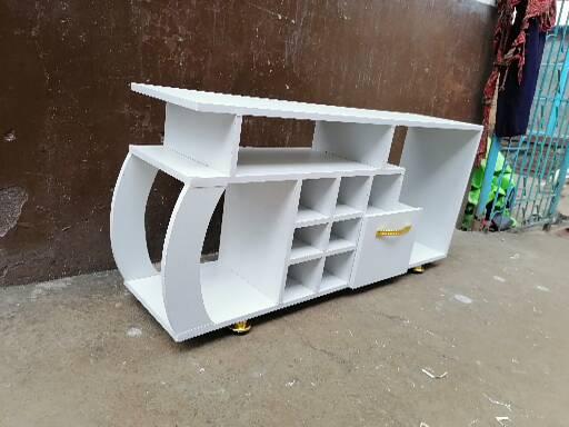 Media Consoles With Integrated Storage Neatly Organized And Display Media Equipment Like TVs Gaming Consoles And Sound Systems They features Open Shelves Closed Cabinets And Drawers