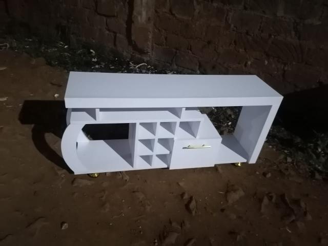 Media Consoles With Integrated Storage Neatly Organized And Display Media Equipment Like TVs Gaming Consoles And Sound Systems They features Open Shelves Closed Cabinets And Drawers