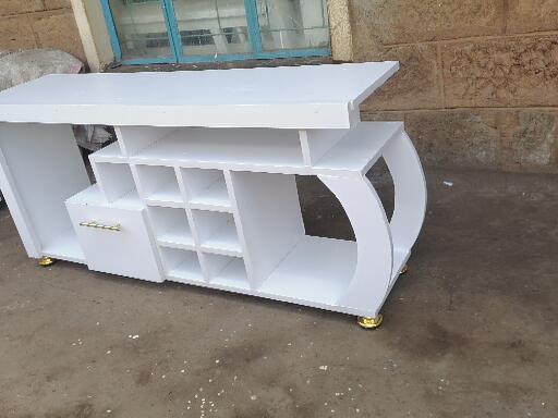 Media Consoles With Integrated Storage Neatly Organized And Display Media Equipment Like TVs Gaming Consoles And Sound Systems They features Open Shelves Closed Cabinets And Drawers