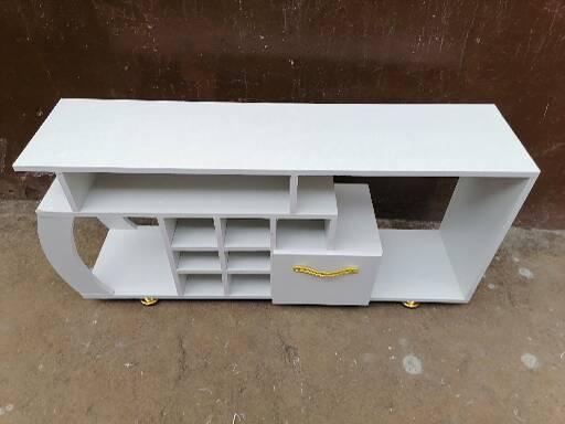 Media Consoles With Integrated Storage Neatly Organized And Display Media Equipment Like TVs Gaming Consoles And Sound Systems They features Open Shelves Closed Cabinets And Drawers