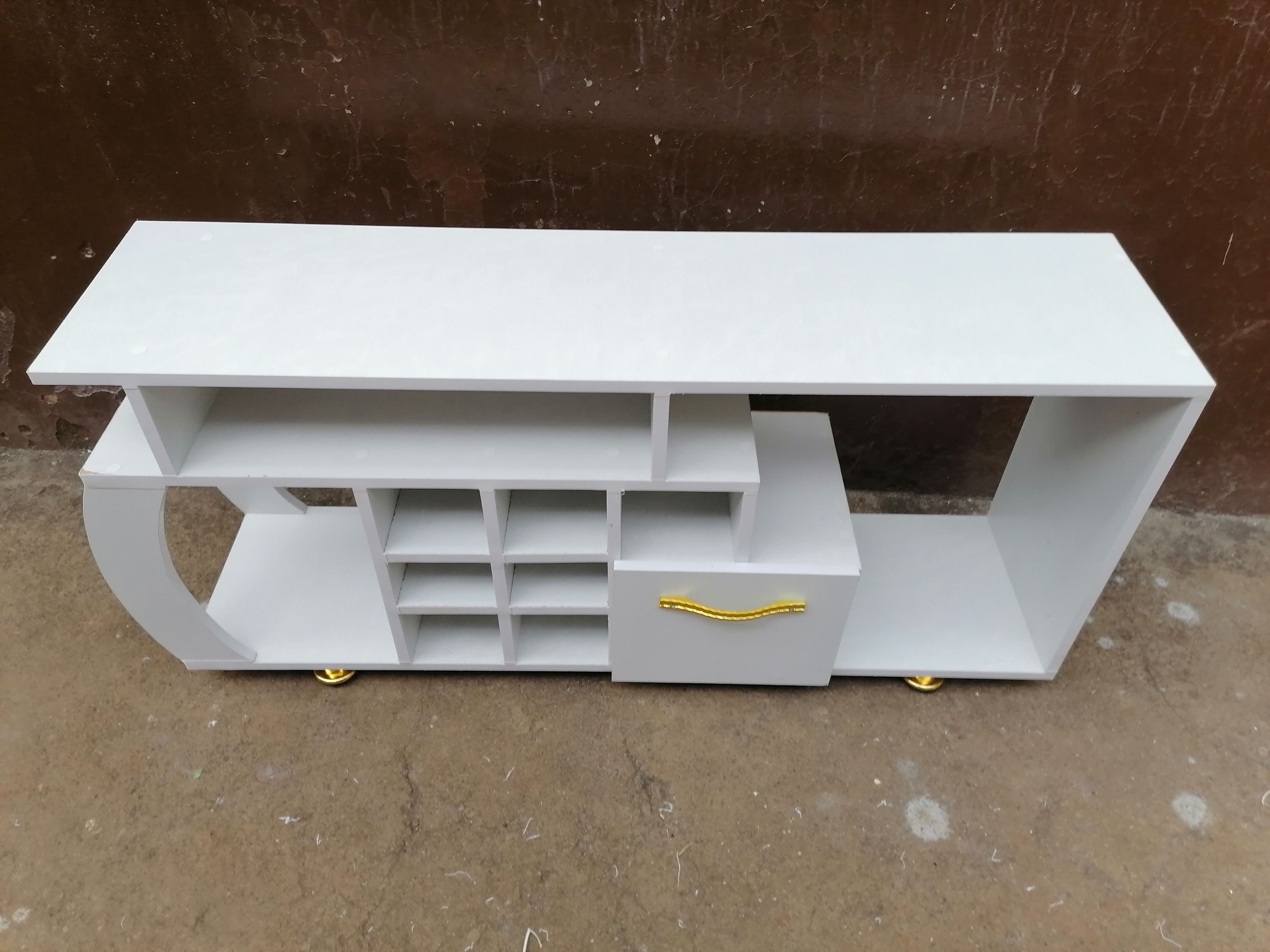 Media Consoles With Integrated Storage Neatly Organized And Display Media Equipment Like TVs Gaming Consoles And Sound Systems They features Open Shelves Closed Cabinets And Drawers