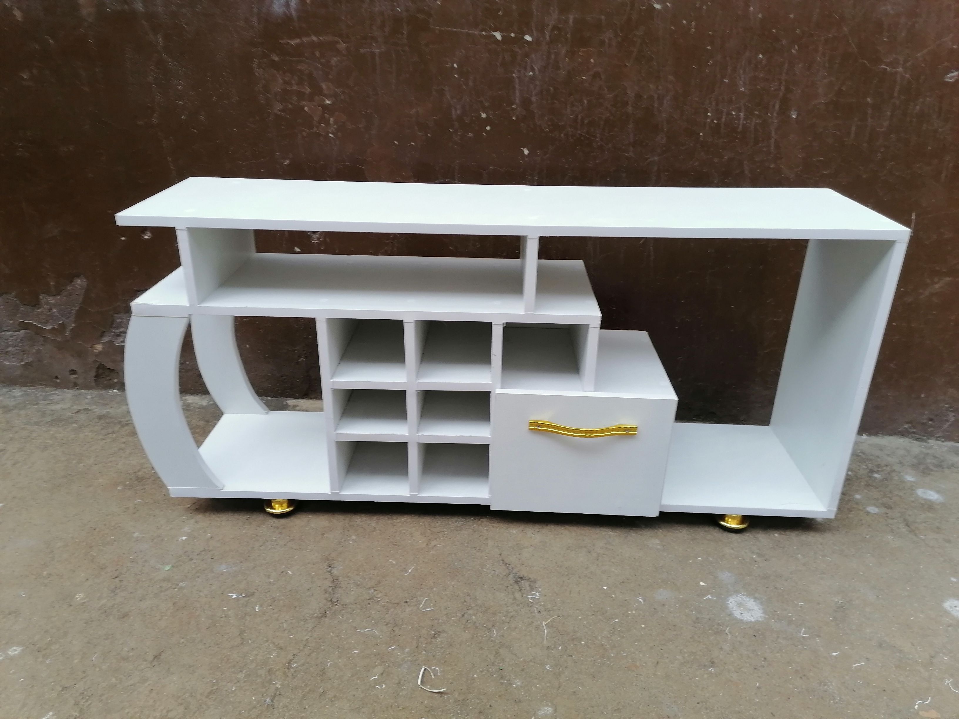 Media Consoles With Integrated Storage Neatly Organized And Display Media Equipment Like TVs Gaming Consoles And Sound Systems They features Open Shelves Closed Cabinets And Drawers