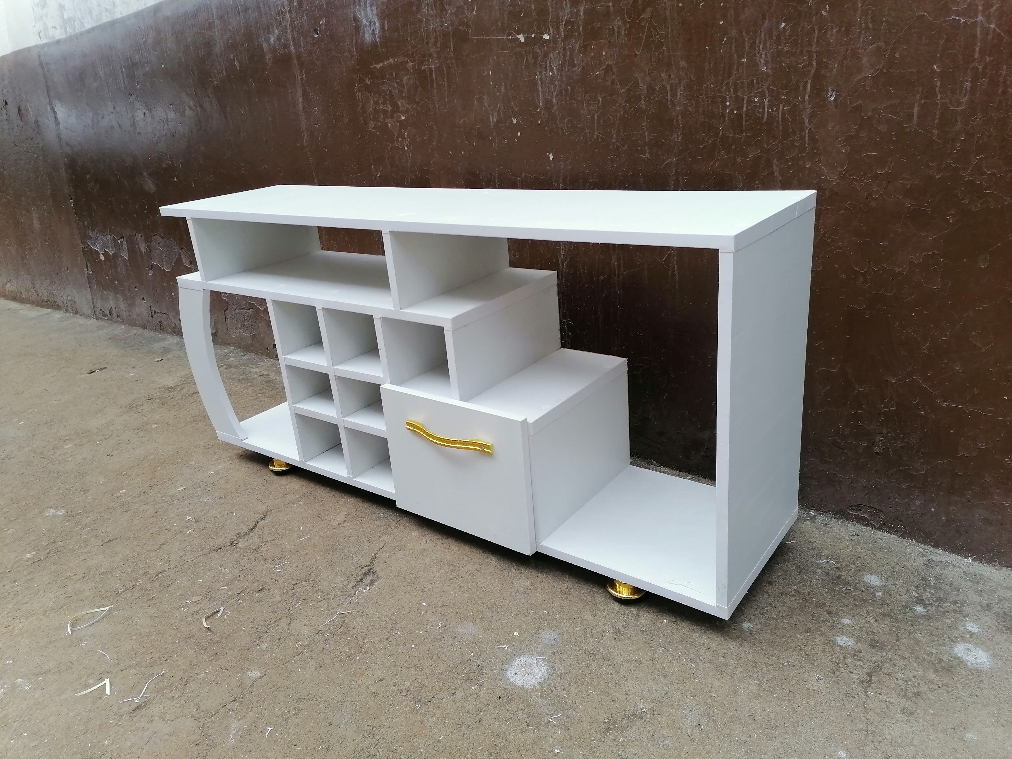 Media Consoles With Integrated Storage Neatly Organized And Display Media Equipment Like TVs Gaming Consoles And Sound Systems They features Open Shelves Closed Cabinets And Drawers