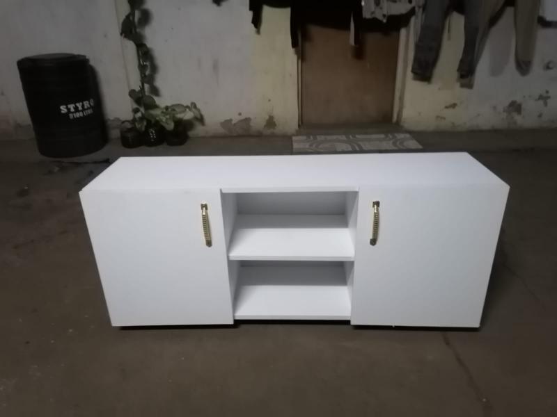 4feet Long Modern TV Stands Enhance Functionality Through Key Features Such As Open Shelving For Easy Access And Ventilation Closed Cabinets  And Drawers For Organized Storage