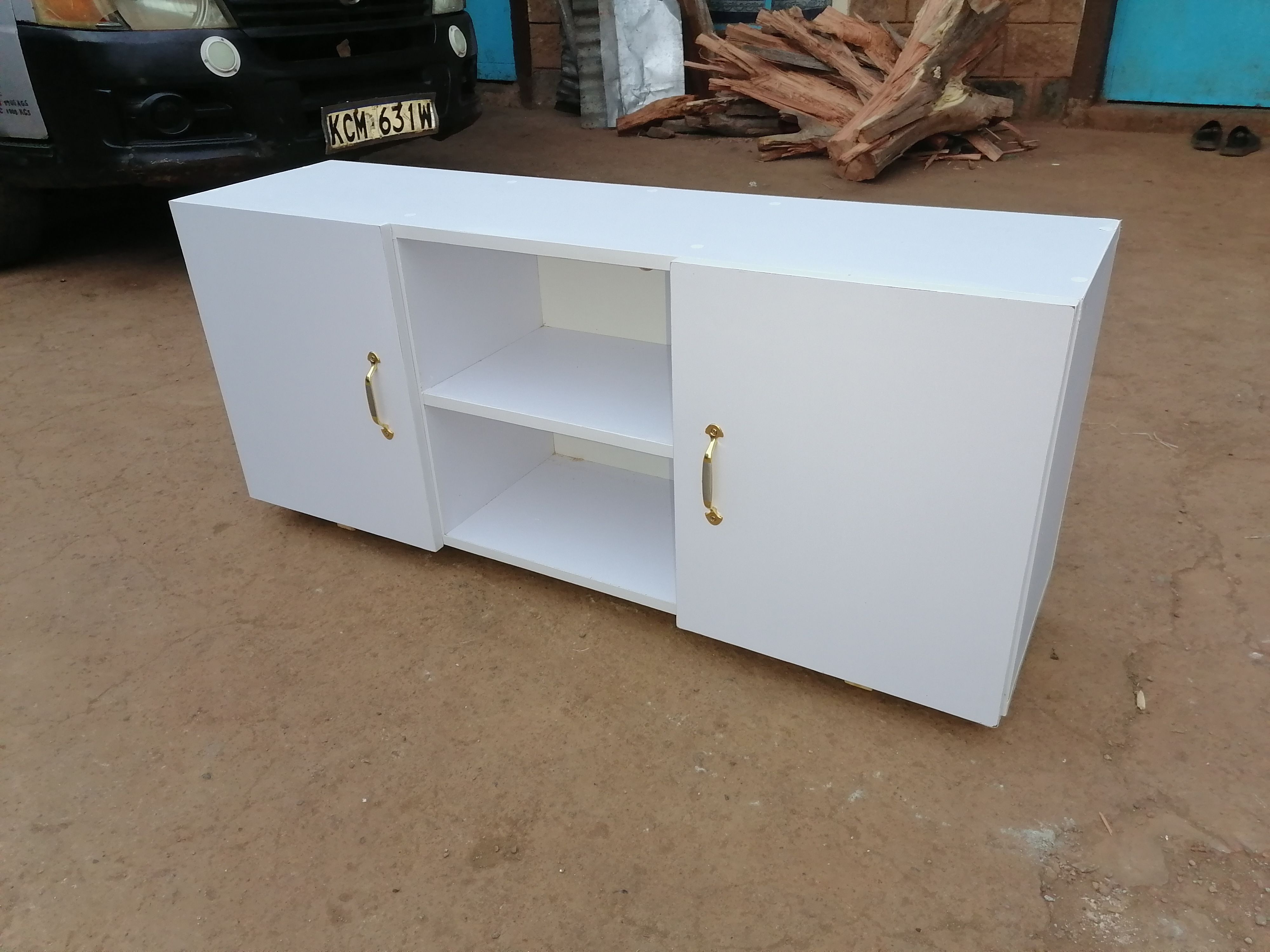 4feet Long Modern TV Stands Enhance Functionality Through Key Features Such As Open Shelving For Easy Access And Ventilation Closed Cabinets  And Drawers For Organized Storage