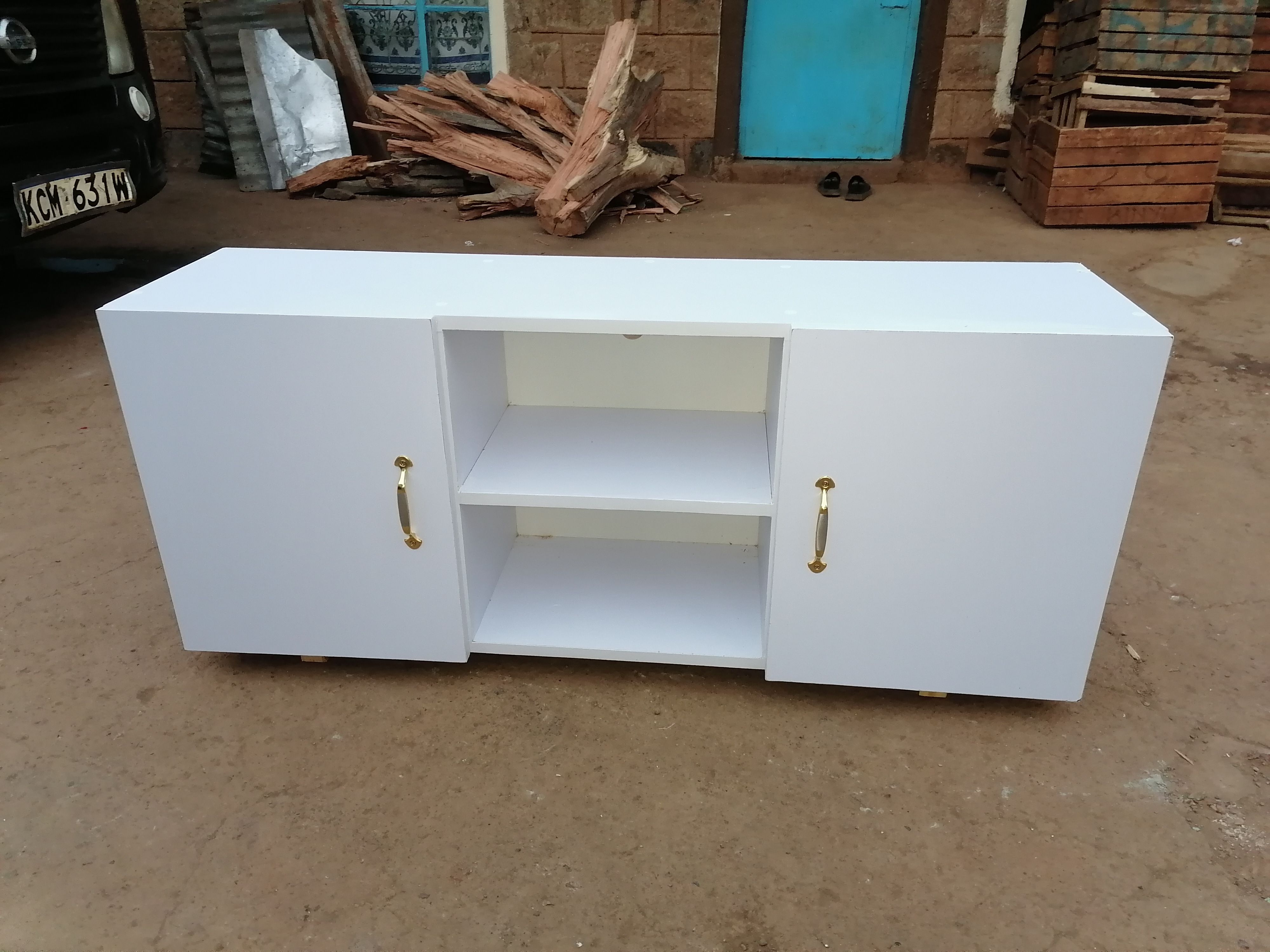 4feet Long Modern TV Stands Enhance Functionality Through Key Features Such As Open Shelving For Easy Access And Ventilation Closed Cabinets  And Drawers For Organized Storage