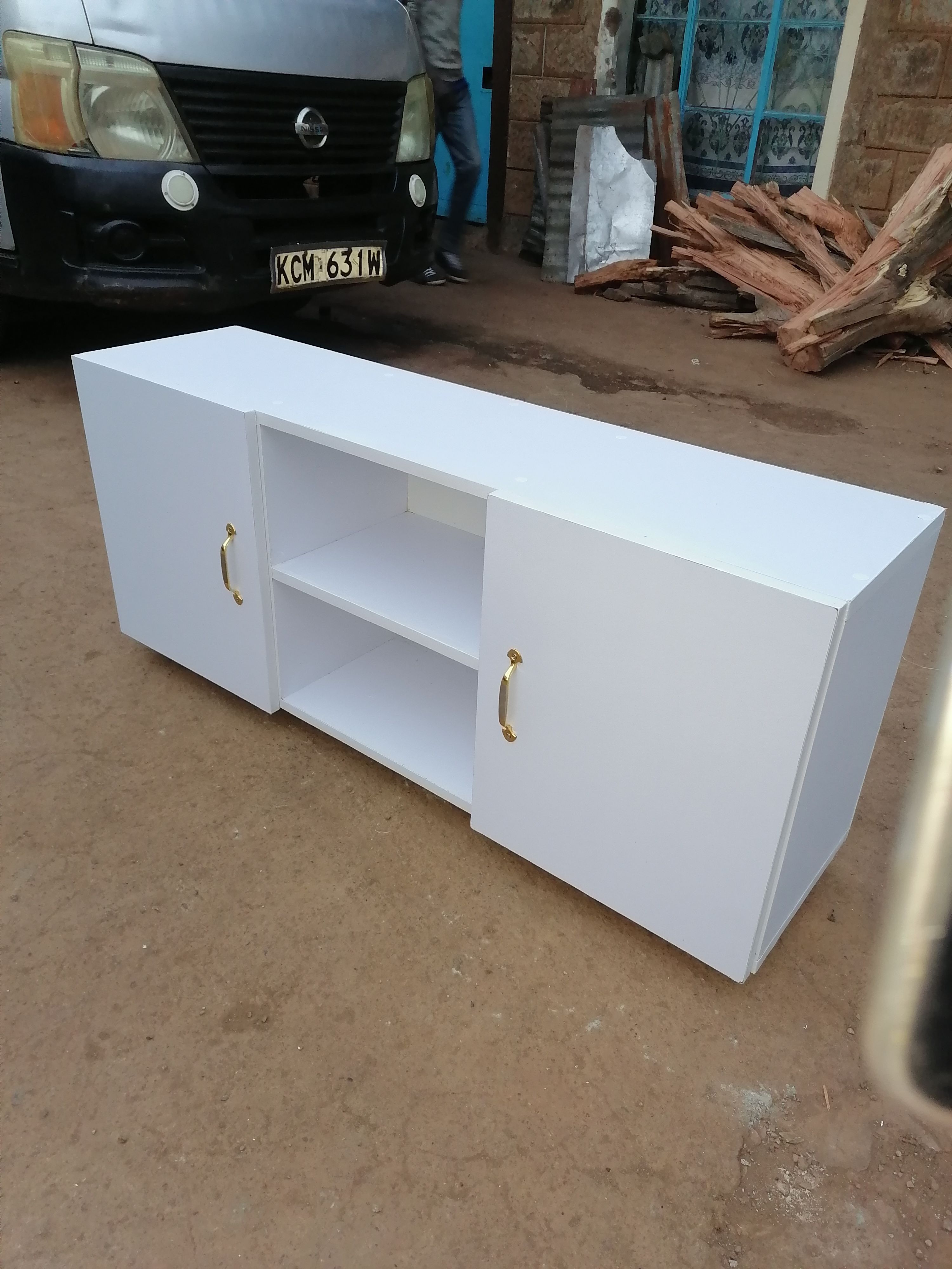 4feet Long Modern TV Stands Enhance Functionality Through Key Features Such As Open Shelving For Easy Access And Ventilation Closed Cabinets  And Drawers For Organized Storage