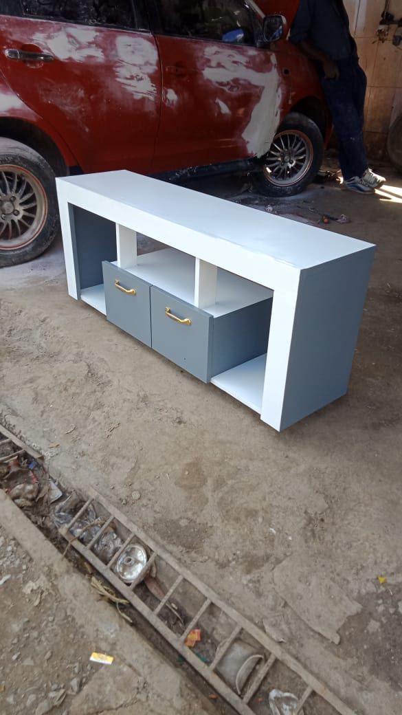 Tv Stand 120cm×32cm×60cm White With Shades Of Grey On The Sides And The Drawer, Well Crafted, Made Of Laminated Chipboard/MDF, With A Closed Cabinet for storage