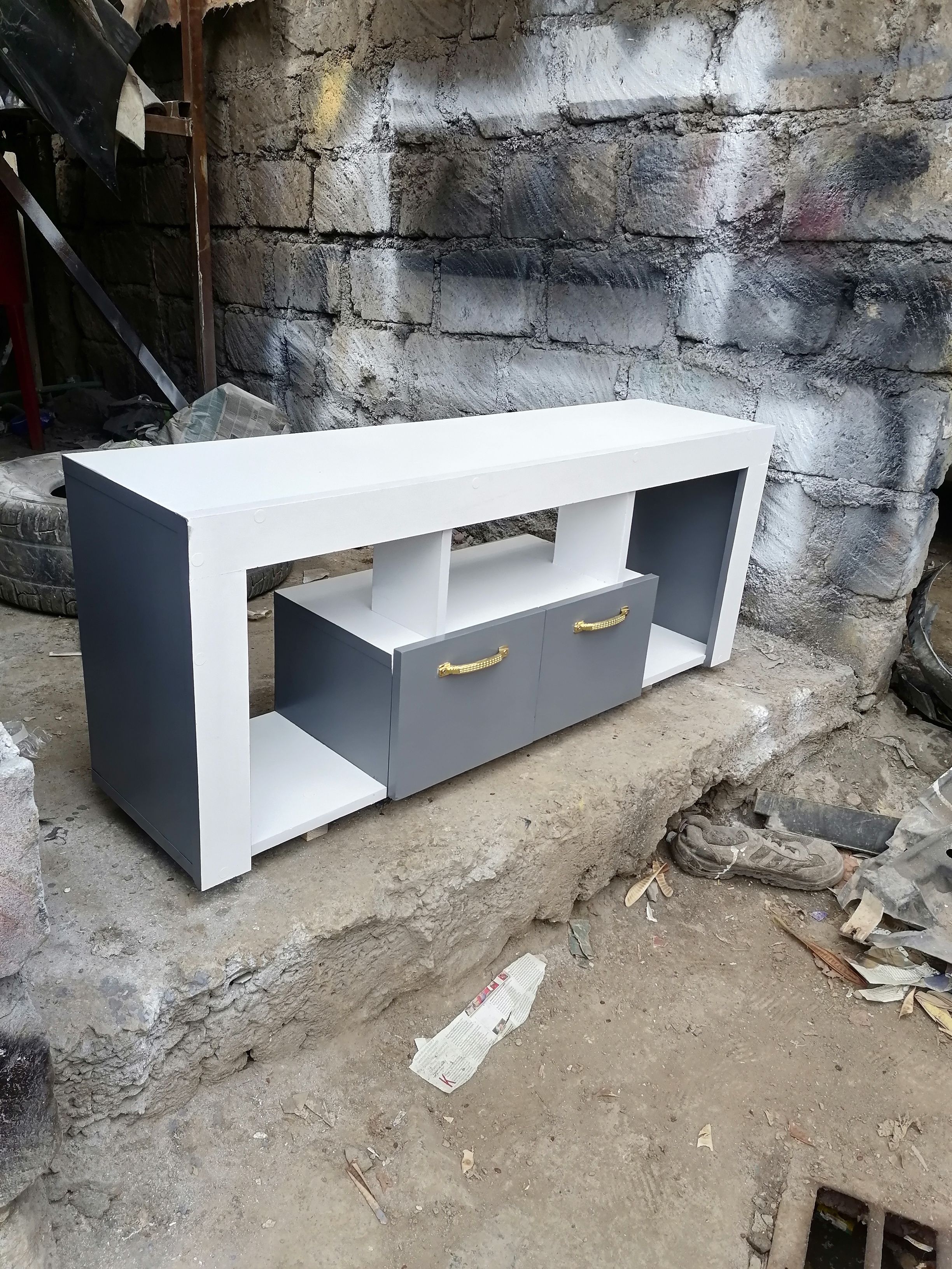 Tv Stand 120cm×32cm×60cm White With Shades Of Grey On The Sides And The Drawer, Well Crafted, Made Of Laminated Chipboard/MDF, With A Closed Cabinet for storage