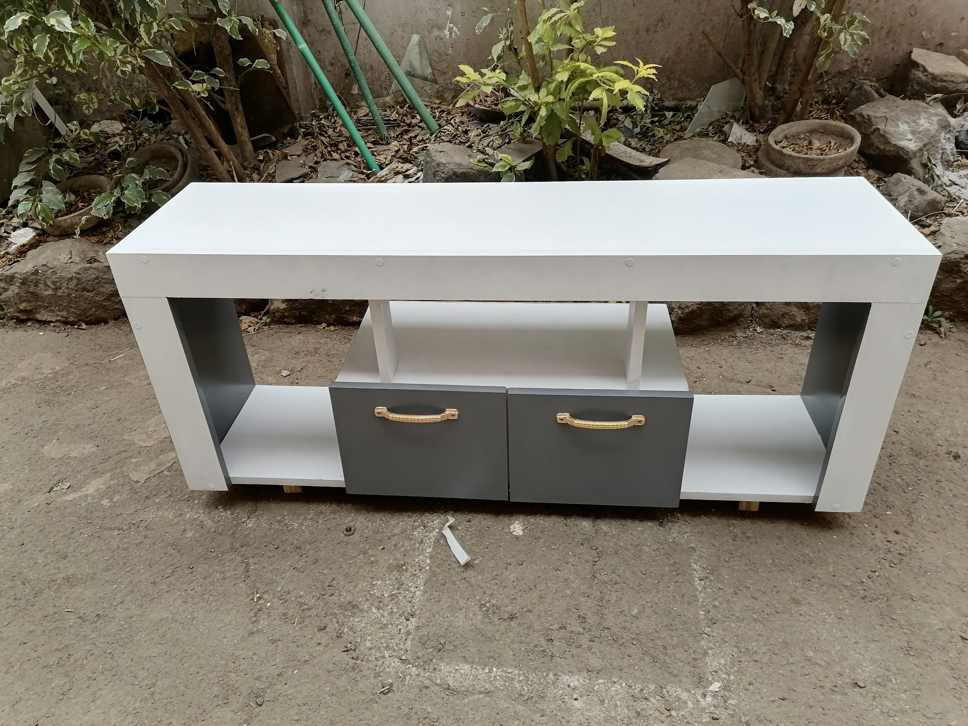 Tv Stand 120cm×32cm×60cm White With Shades Of Grey On The Sides And The Drawer, Well Crafted, Made Of Laminated Chipboard/MDF, With A Closed Cabinet for storage