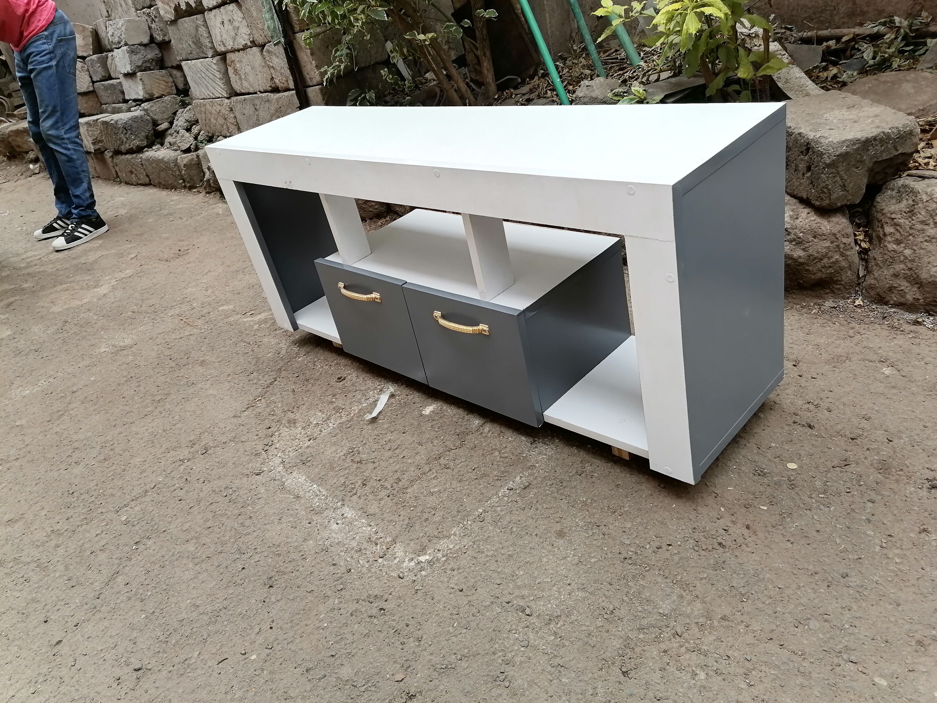 Tv Stand 120cm×32cm×60cm White With Shades Of Grey On The Sides And The Drawer, Well Crafted, Made Of Laminated Chipboard/MDF, With A Closed Cabinet for storage