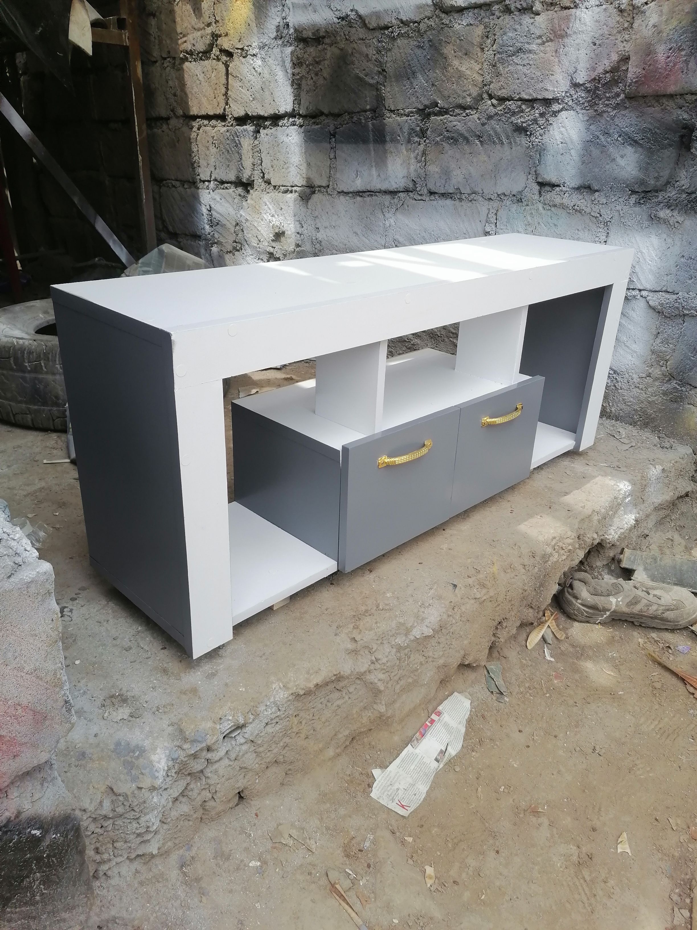 Tv Stand 120cm×32cm×60cm White With Shades Of Grey On The Sides And The Drawer, Well Crafted, Made Of Laminated Chipboard/MDF, With A Closed Cabinet for storage