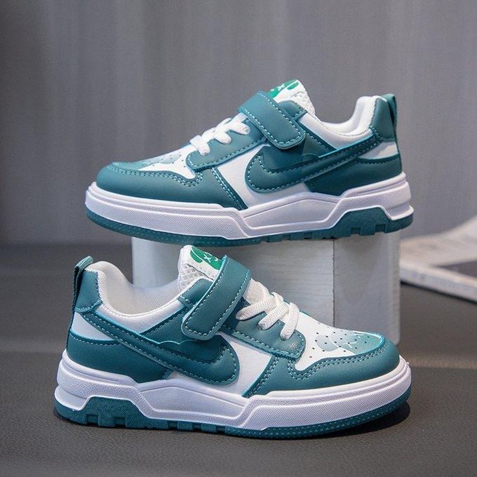 Fashion flat leather sneakers with breathable mesh for outdoor activities comfortable and suitable for tennis. Cool skate shoes for kids