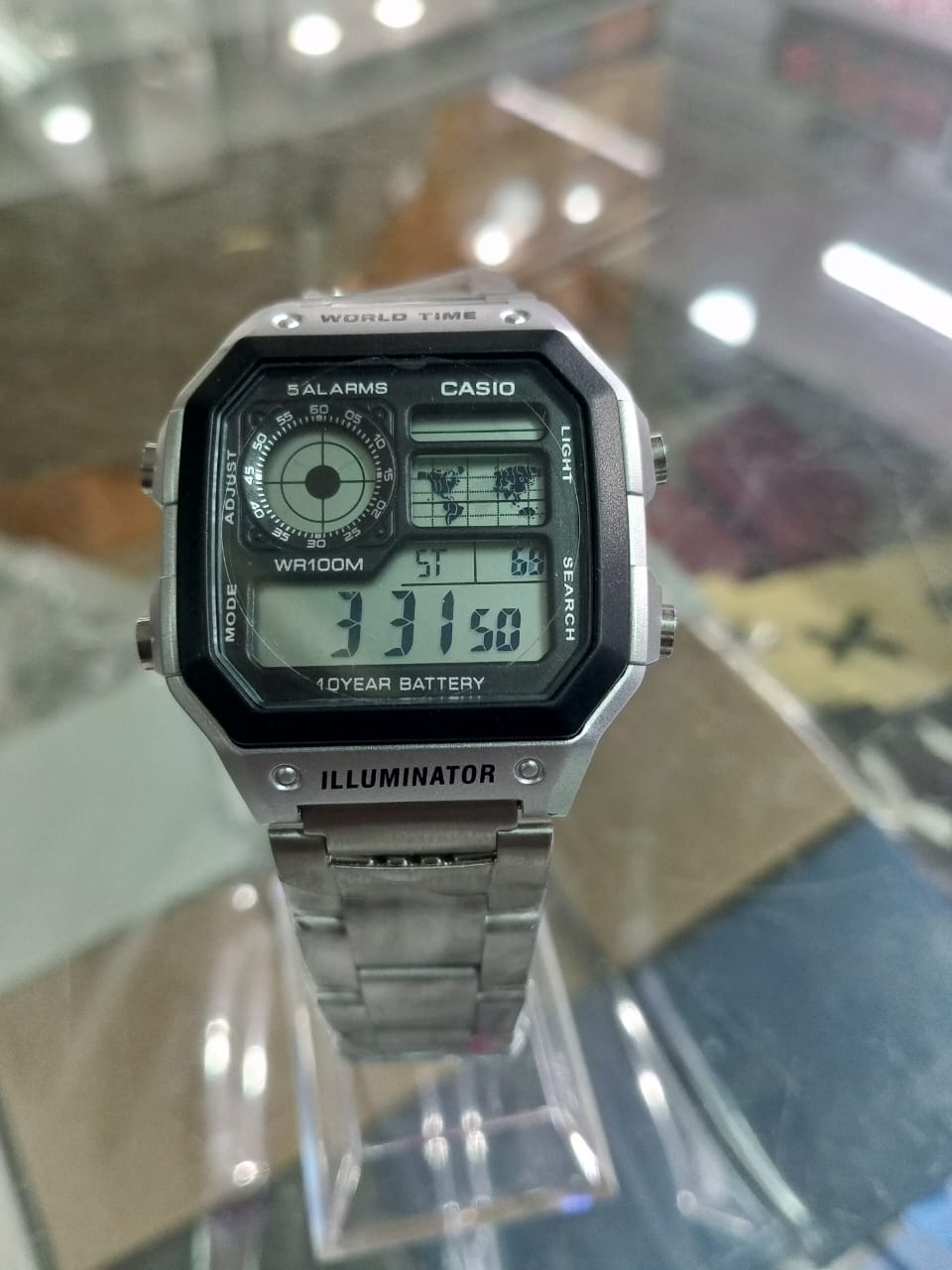Casio World Time Illuminator | Men’s Digital Watch | 100M WR | Multi Alarms | 100 SEC Stopwatch | Countdown Timer | World Map for World Time | LED Light | LC Analog Display | 10 Year Battery