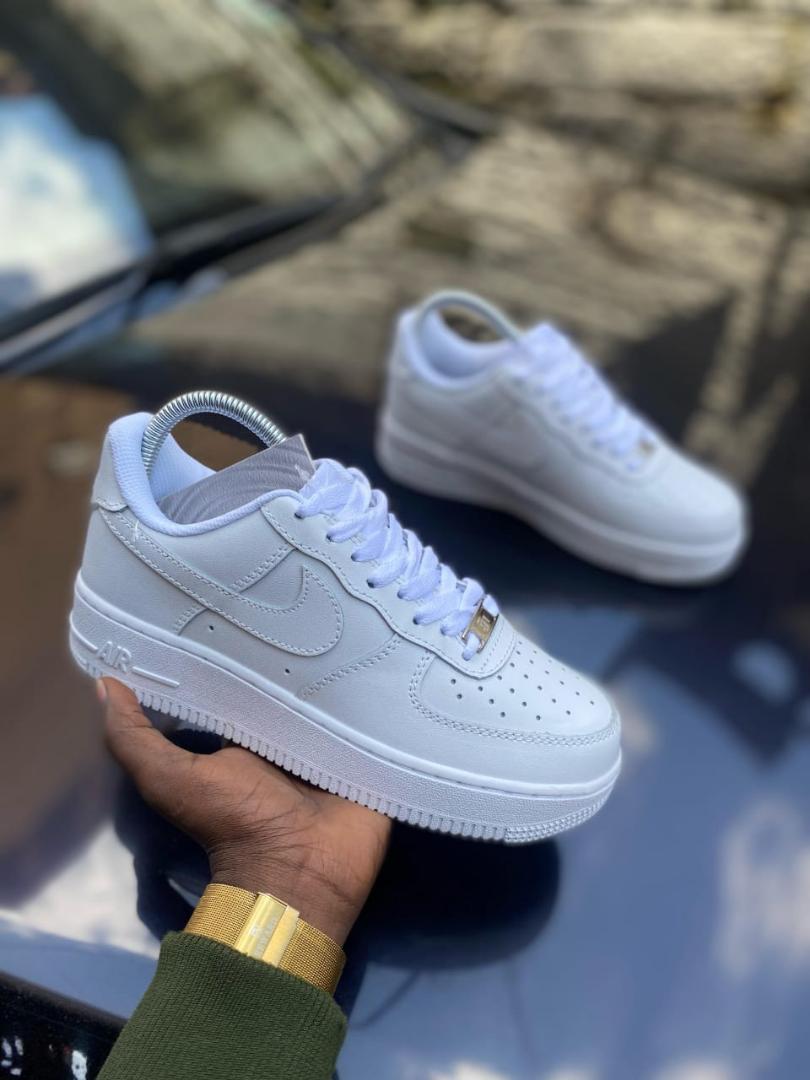 airforce 1, white sneakers. Leather shoes for both boys and Girls, ladies white shoes. Fashionable and elegant sneaker.