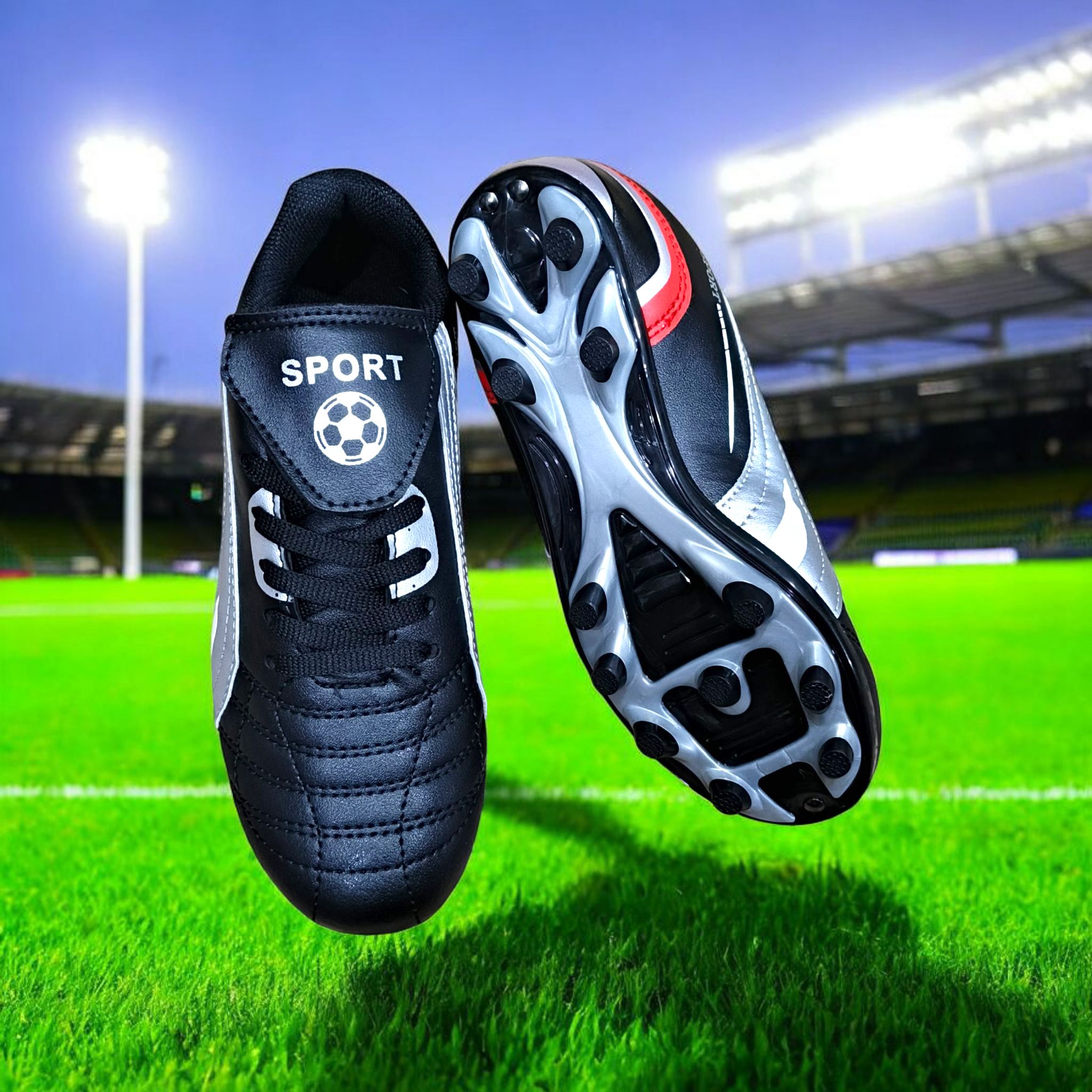 KIDS SOCCER BOOTS. A PAIR OF SOCCER CLEATS; FOOTBALL BOOTS.