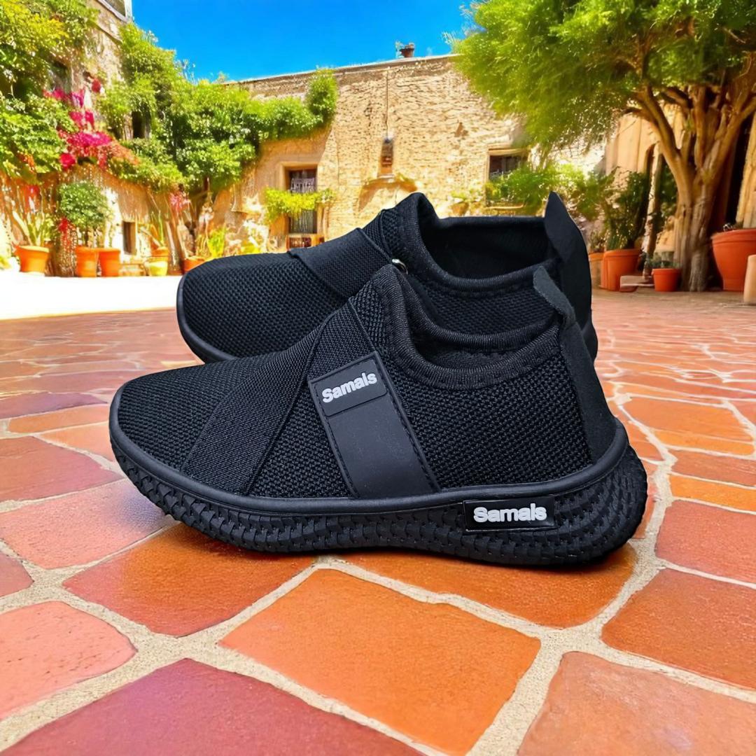 Step into Sleek, All-Black Slip-Ons for kids and adults sneakers. Black never looked this bold, slip-on mesh sneakers. Effortless style in every step, build for the street. School sport shoes.