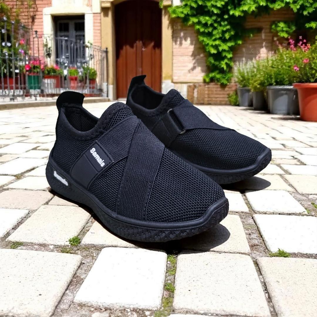 Step into Sleek, All-Black Slip-Ons for kids and adults sneakers. Black never looked this bold, slip-on mesh sneakers. Effortless style in every step, build for the street. School sport shoes.