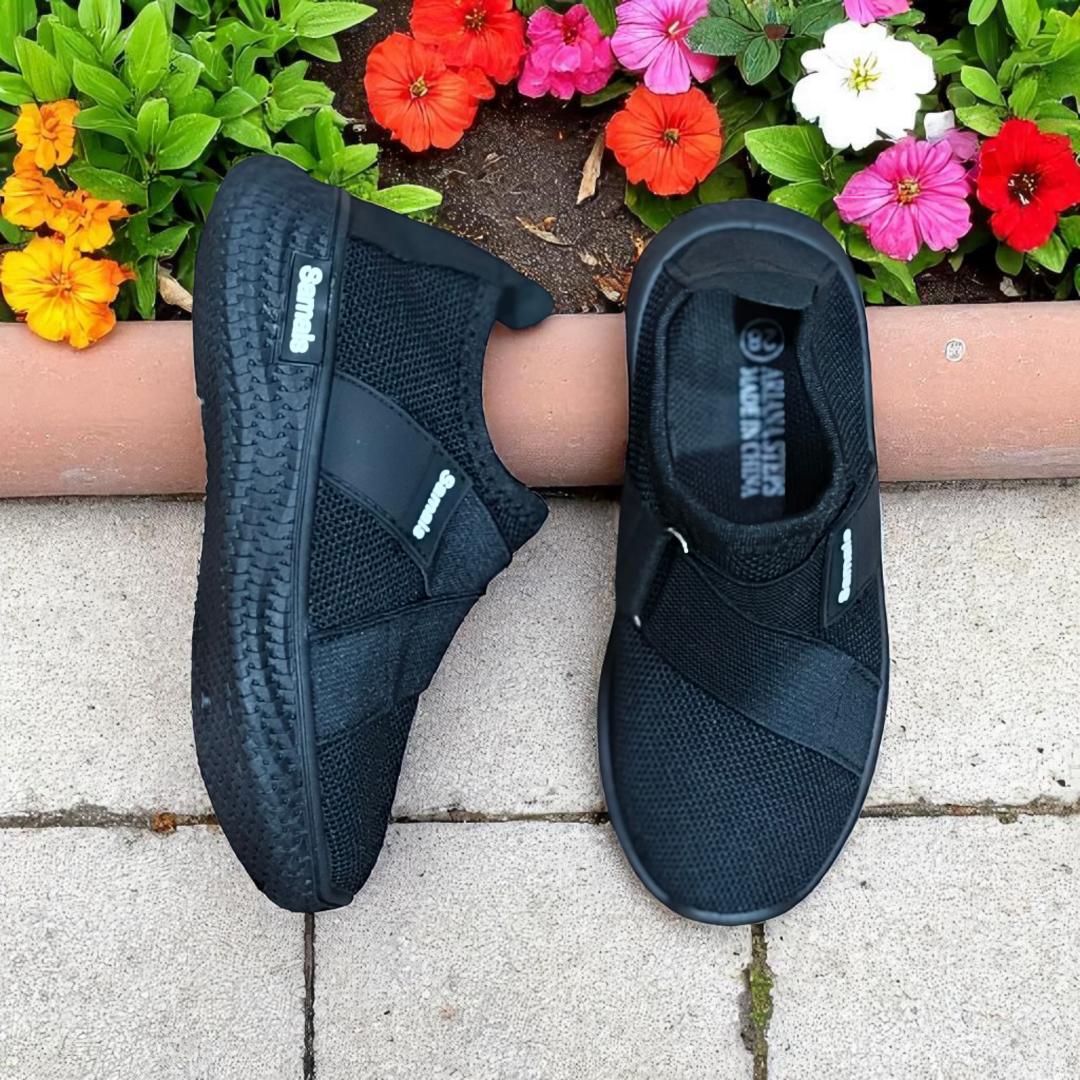 Step into Sleek, All-Black Slip-Ons for kids and adults sneakers. Black never looked this bold, slip-on mesh sneakers. Effortless style in every step, build for the street. School sport shoes.
