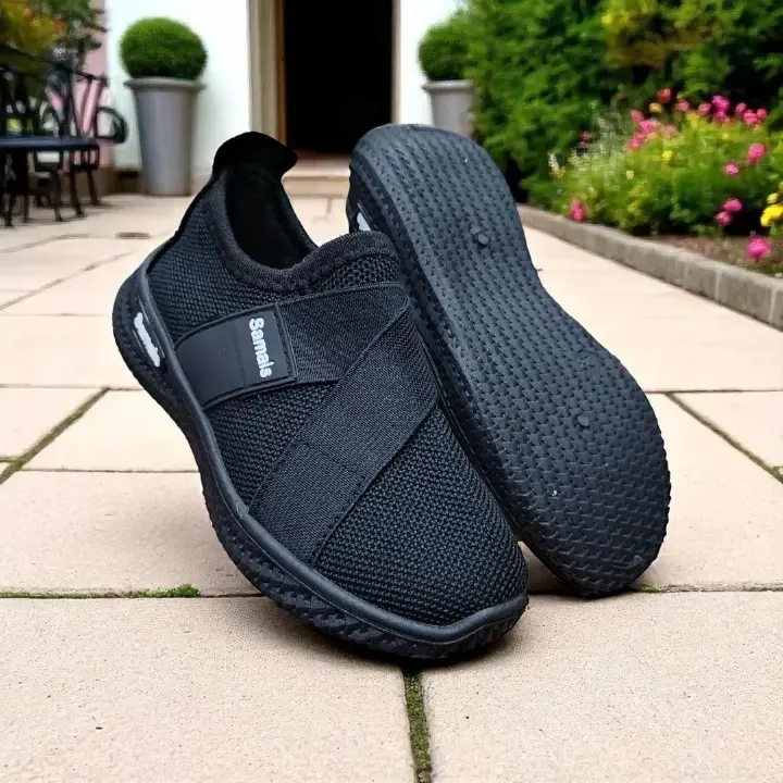 Step into Sleek, All-Black Slip-Ons for kids and adults sneakers. Black never looked this bold, slip-on mesh sneakers. Effortless style in every step, build for the street. School sport shoes.