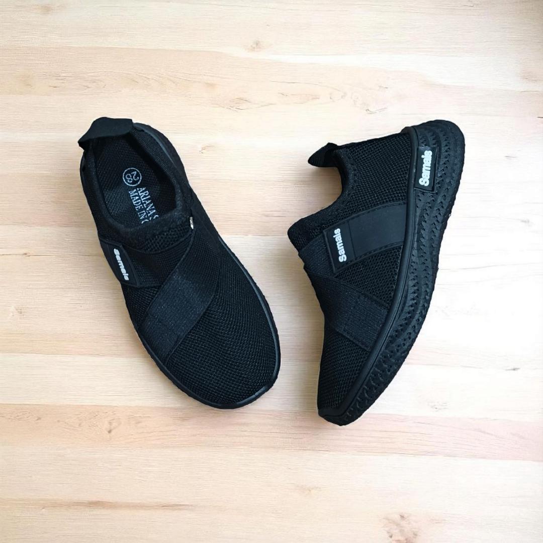 Step into Sleek, All-Black Slip-Ons for kids and adults sneakers. Black never looked this bold, slip-on mesh sneakers. Effortless style in every step, build for the street. School sport shoes.