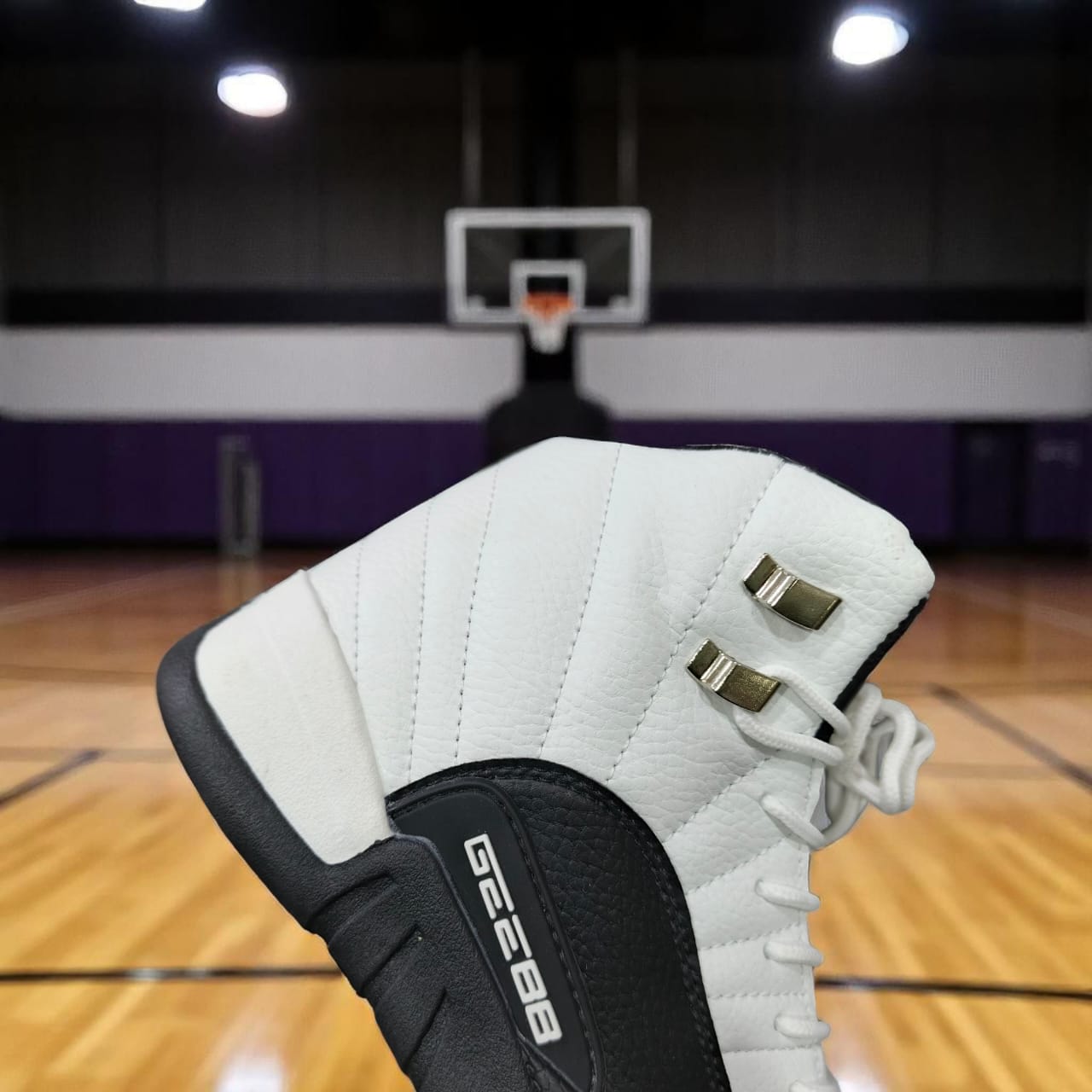 Classic High-top black , red, blue and white Basketball sneakers. Two-Tone Retro leather court sneakers. Monochrome Basketball sneakers with metallic accent. Timeless swagger, Bold streetwear. The com