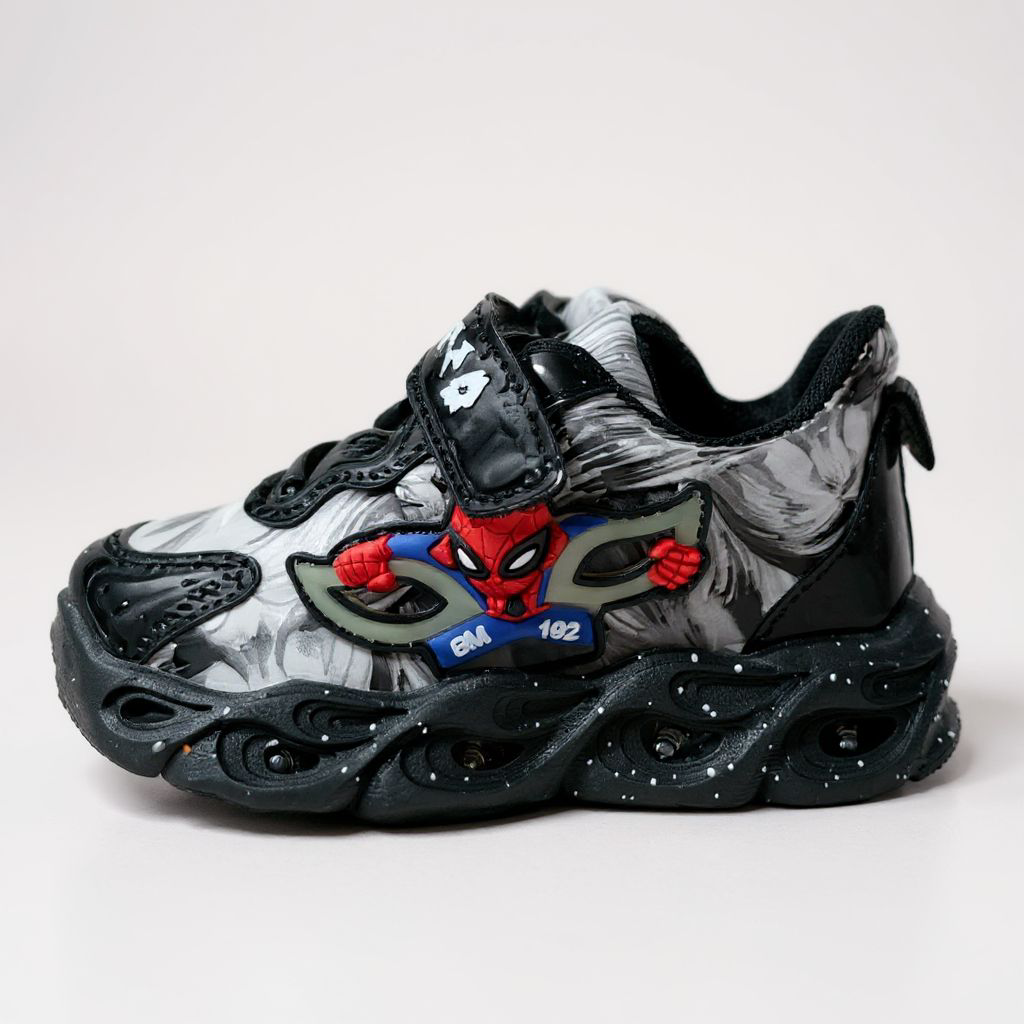 Spider-Sense Speedsters. Web-Slinging Wonder Kicks. Black and white Marvel Swirl Sneakers, Cosmic spider-Stardust Shoes. Little Hero Galaxy Runners. Adventure-Ready Marble Runners. Black Kicks.
