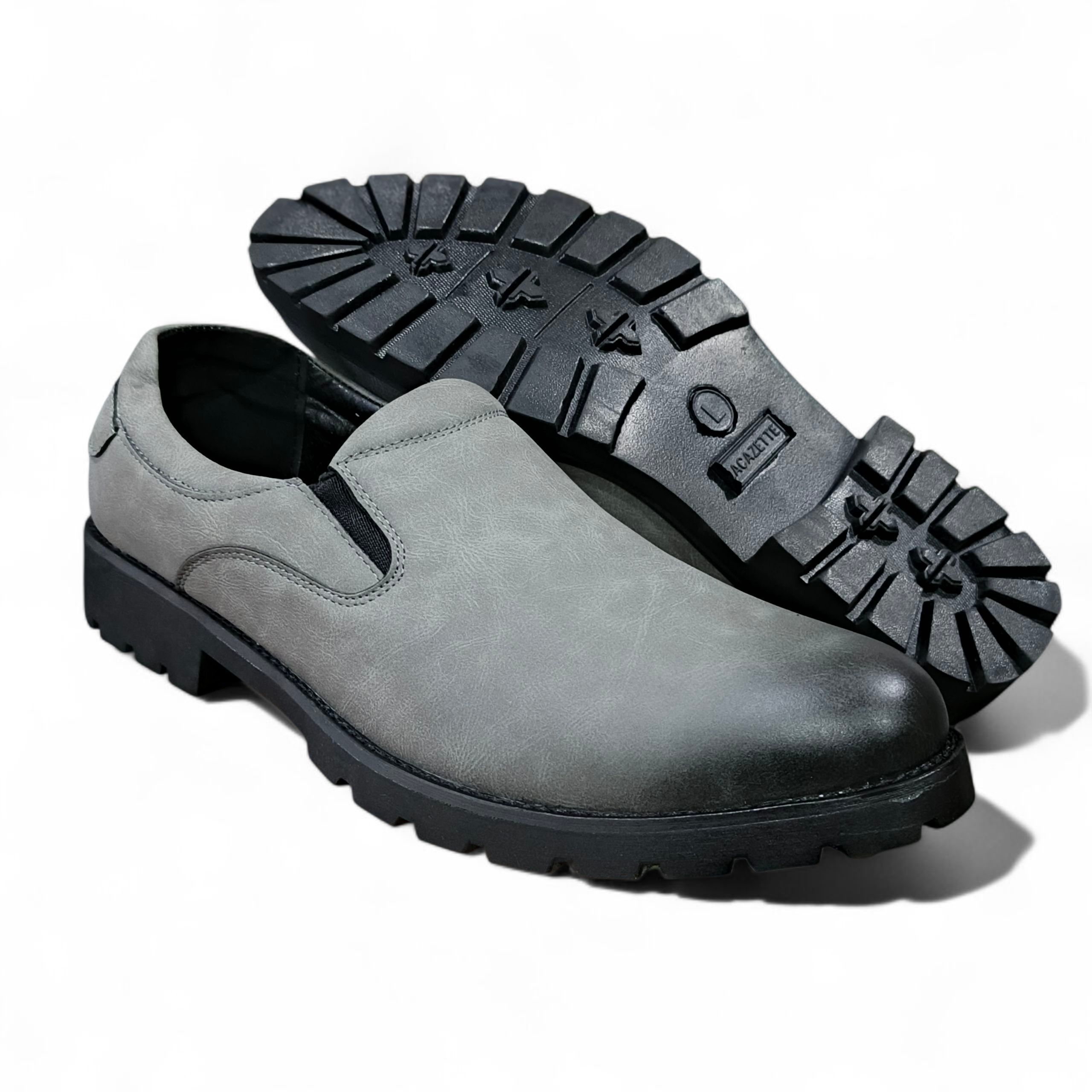The Executive Glide Slip-On Leather Loafers for the Modern Man. Grey Leather Slip-Ons With Durable Tread. Instant Upgrade, Premium Grey Faux Leather comfort slip-ons. The essential comfort loafers. Wa
