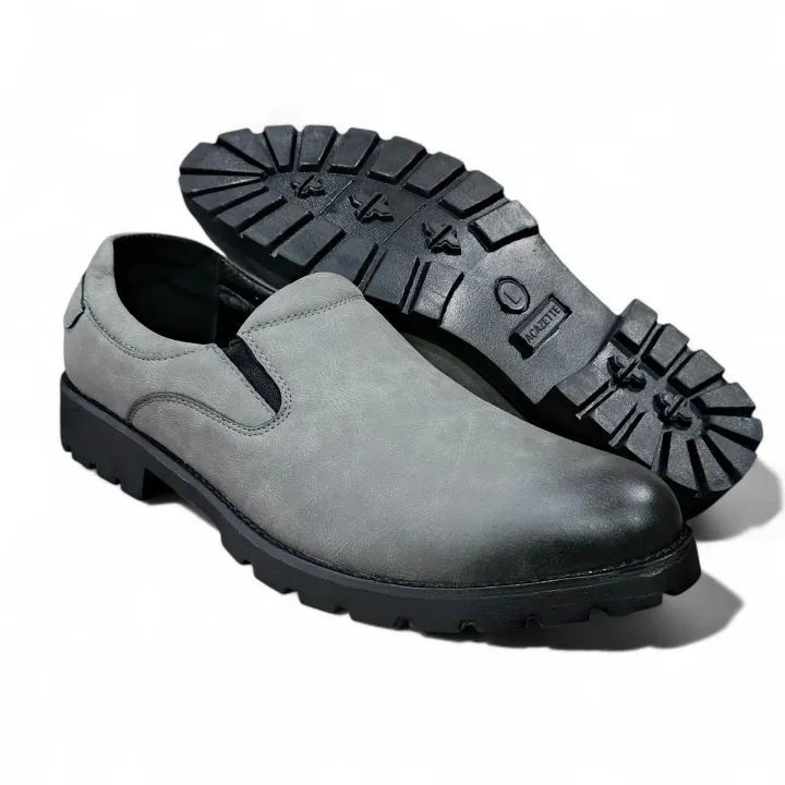 The Executive Glide Slip-On Leather Loafers for the Modern Man. Grey Leather Slip-Ons With Durable Tread. Instant Upgrade, Premium Grey Faux Leather comfort slip-ons. The essential comfort loafers. Wa