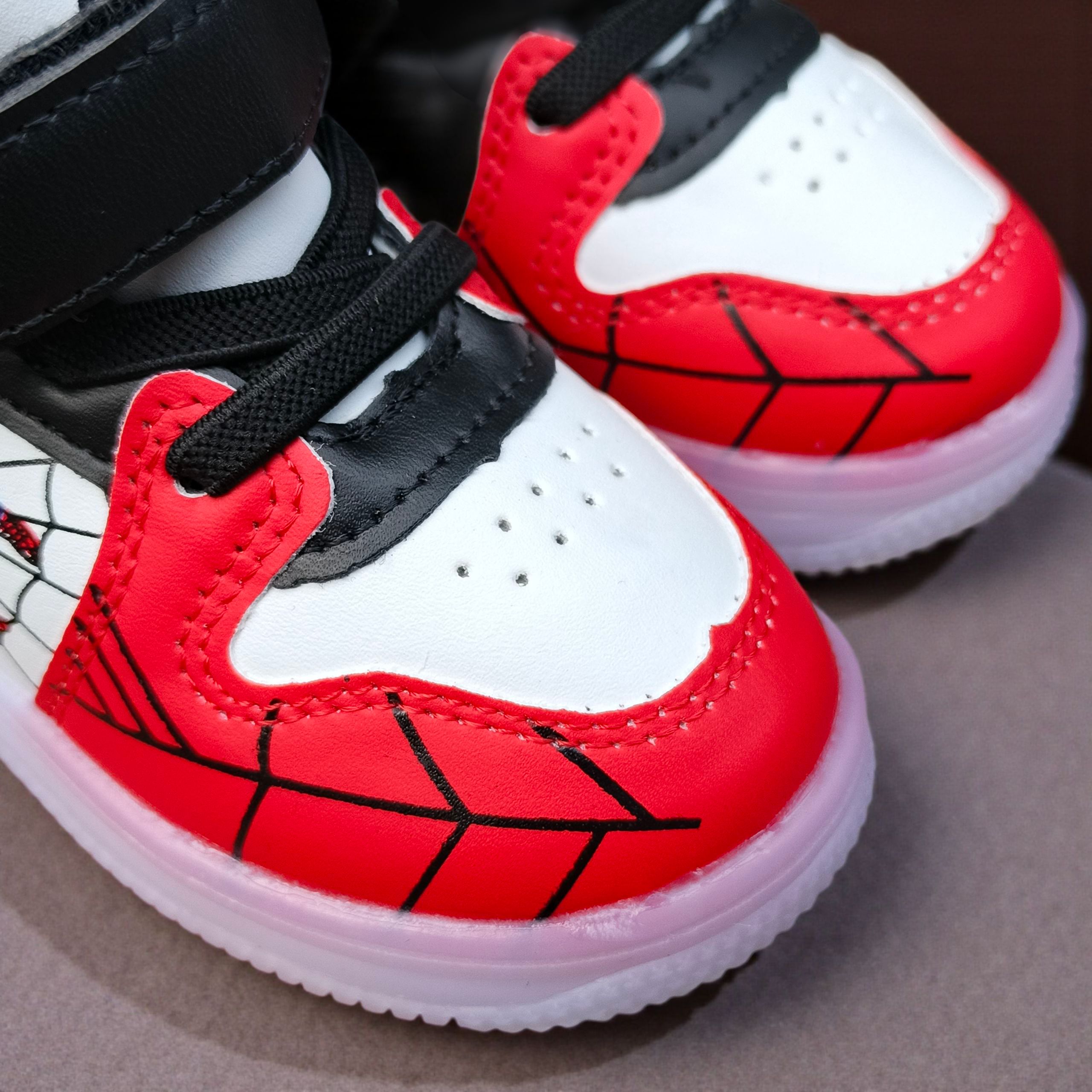 Marvel Spider Man Light-up High-top Sneakers for Boys. Red, black & white web design. Spiderman Flashing high-top shoes for toddler or little boys. Durable Hight-top Sneakers with Iconic Webbing, Red