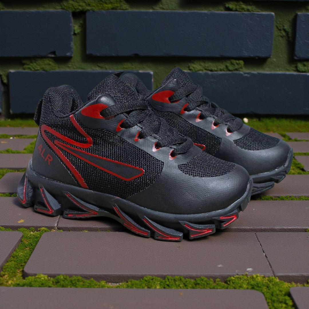 ALR V-Design Athletic kids Shoes. The shoes feature a black color scheme with white, gold,red and orange accents. Suitable for sports and averyday wear.