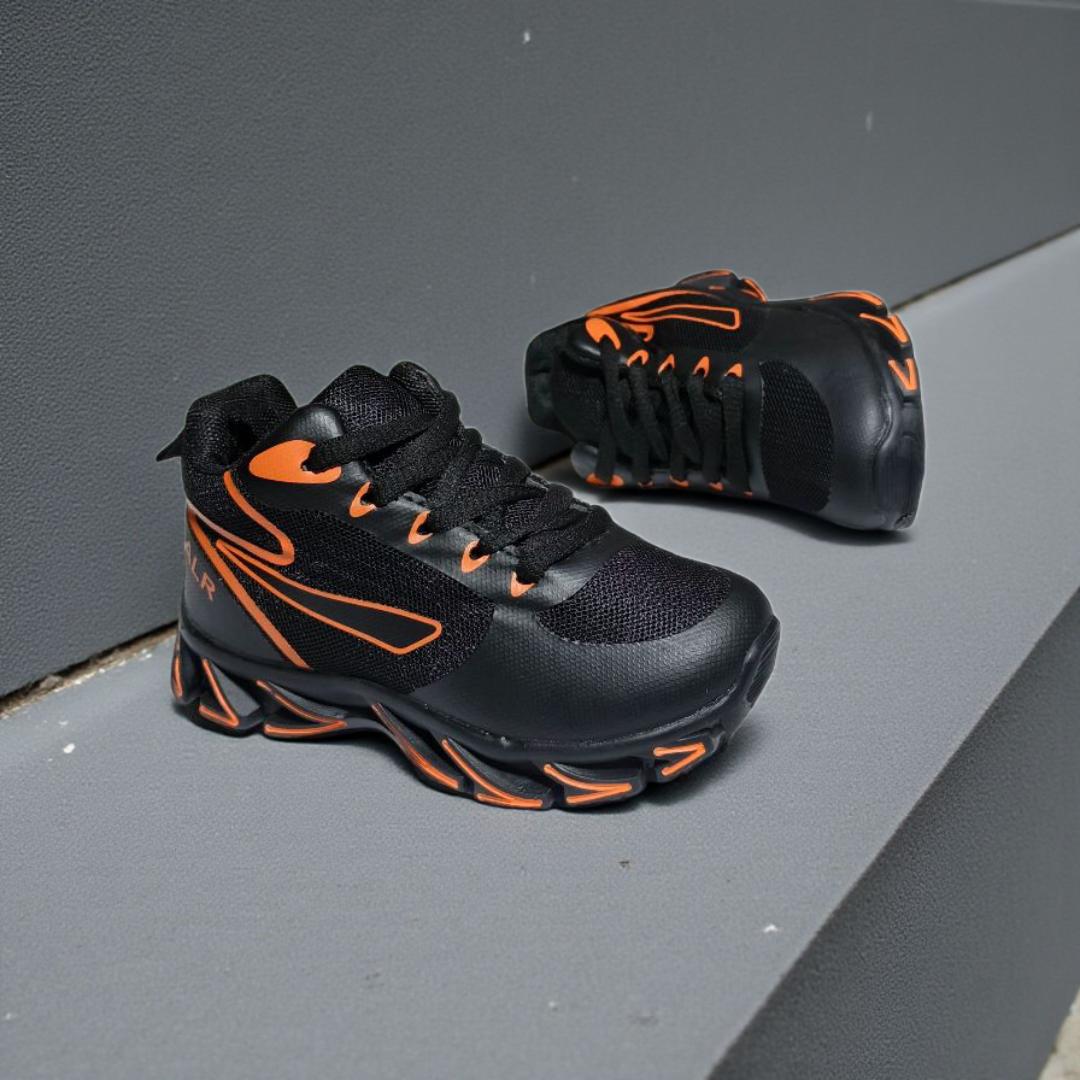 ALR V-Design Athletic kids Shoes. The shoes feature a black color scheme with white, gold,red and orange accents. Suitable for sports and averyday wear.