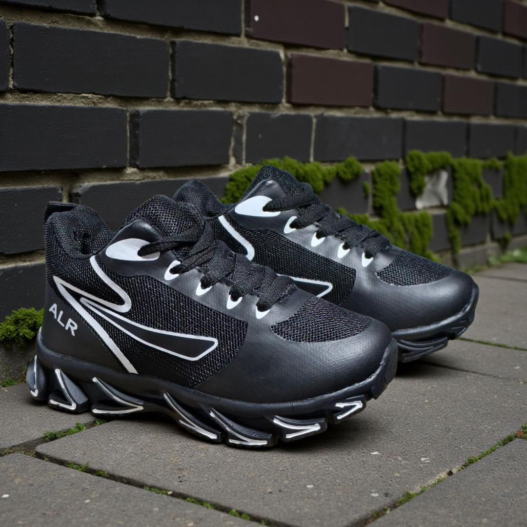 ALR V-Design Athletic kids Shoes. The shoes feature a black color scheme with white, gold,red and orange accents. Suitable for sports and averyday wear.