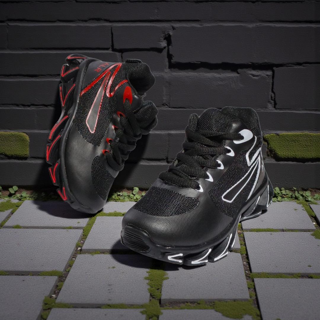 ALR V-Design Athletic kids Shoes. The shoes feature a black color scheme with white, gold,red and orange accents. Suitable for sports and averyday wear.