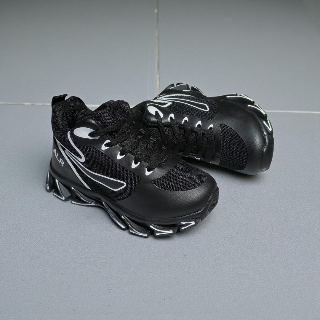 ALR V-Design Athletic kids Shoes. The shoes feature a black color scheme with white, gold,red and orange accents. Suitable for sports and averyday wear.