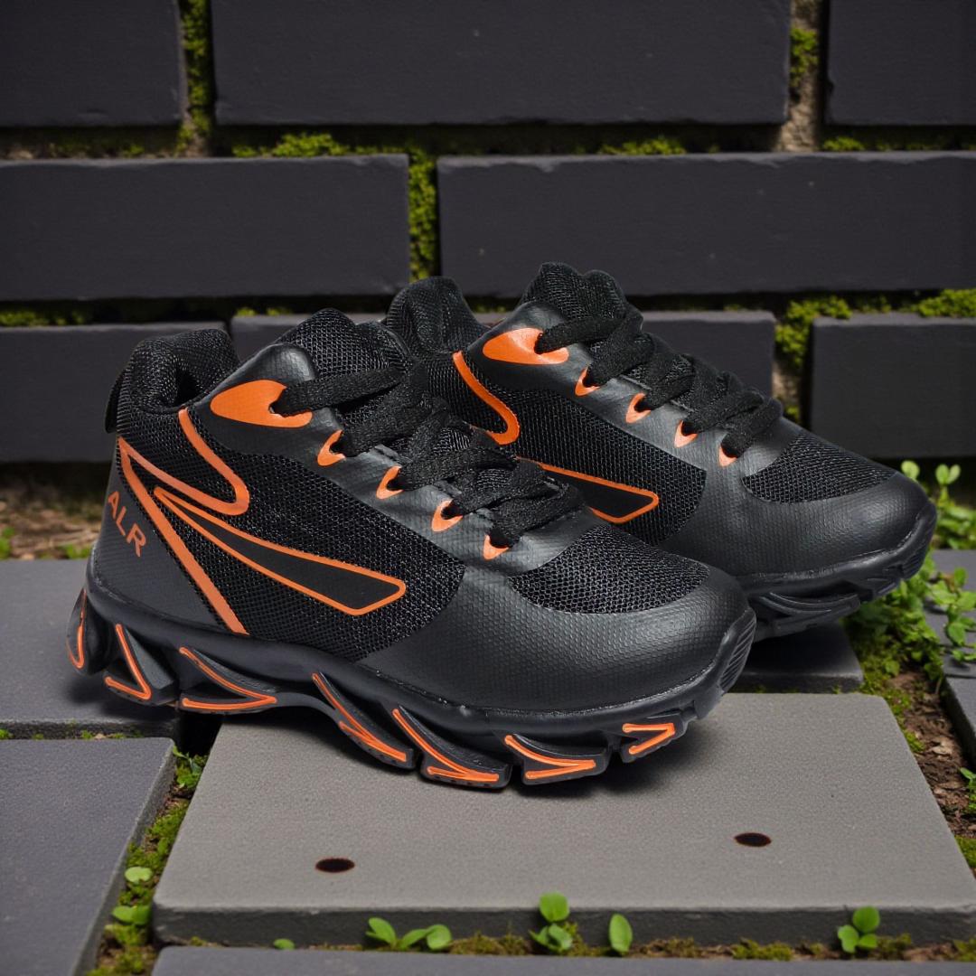 ALR V-Design Athletic kids Shoes. The shoes feature a black color scheme with white, gold,red and orange accents. Suitable for sports and averyday wear.
