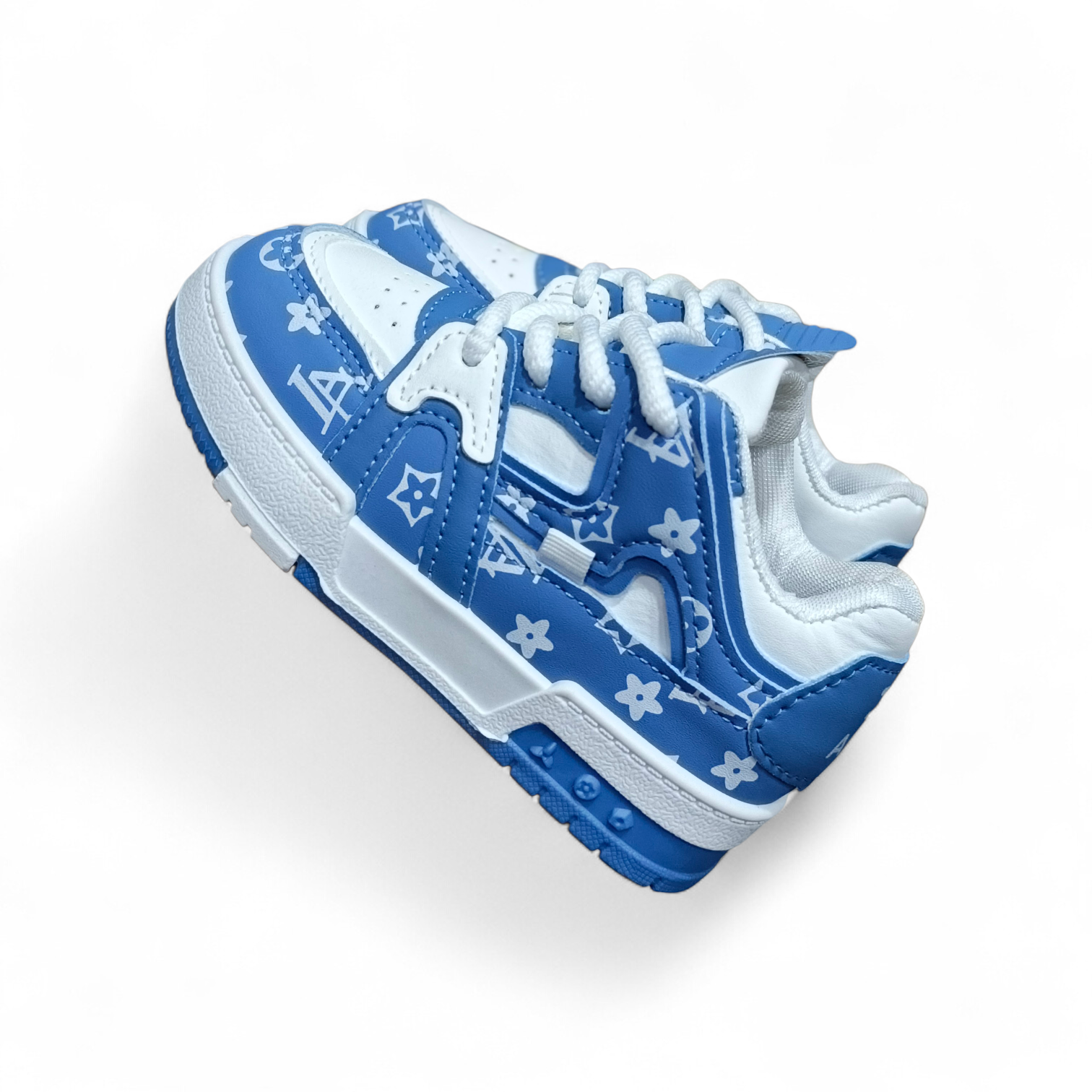 Kids Blue & White stars sneakers. Unisex kids blue star pattern sneaker for kids. Designer inspired kids blue sneakers. Fun and stylish footwear. Easy to wear lace-up kids shoes.