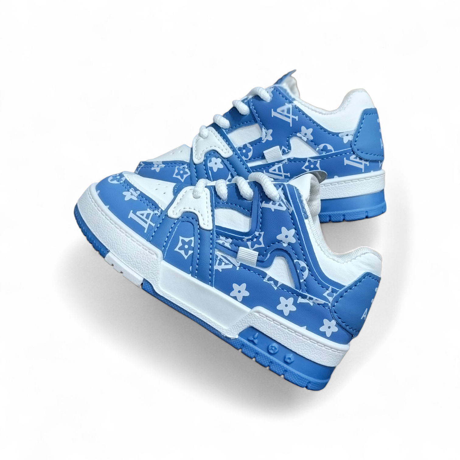 Kids Blue & White stars sneakers. Unisex kids blue star pattern sneaker for kids. Designer inspired kids blue sneakers. Fun and stylish footwear. Easy to wear lace-up kids shoes.