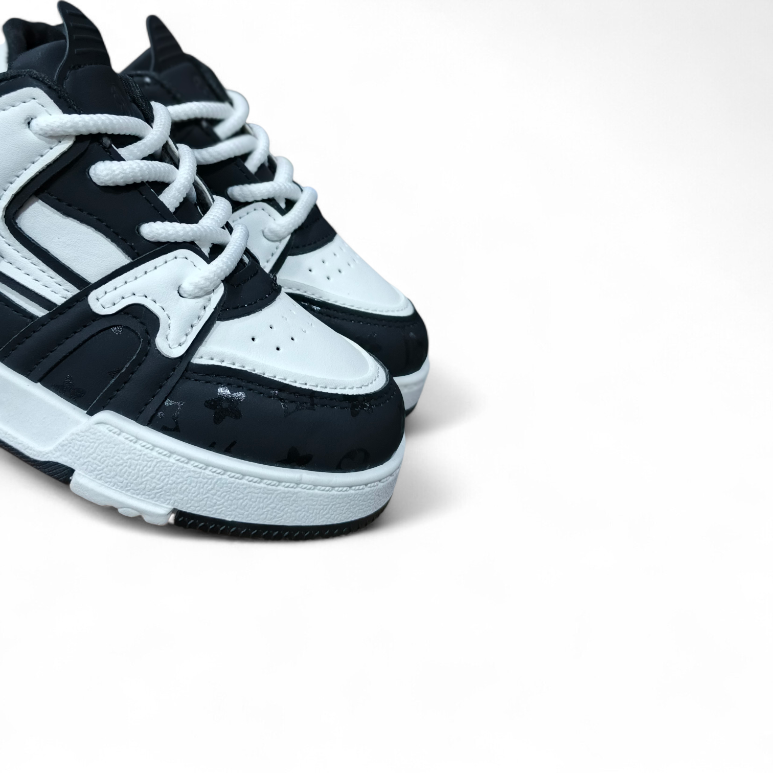 Classic Black & White Kids' Sneakers. Durable and stylish sneaker for Kids. Kids Everyday sneakers. Two tone shoes, lightweight and supportive sneaker trainers, easy to wear and durable.