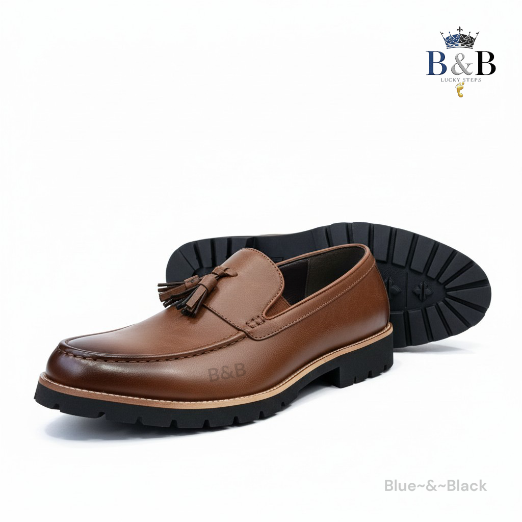 The Hybrid Loafer. Men's Rugged Tassel Loafers in Burnished Walnut,  Heritage Leather Slip-Ons with Commando Lug Soles. Men’s Toffee Brown Faux-Leather Loafers with Cleated Treads.