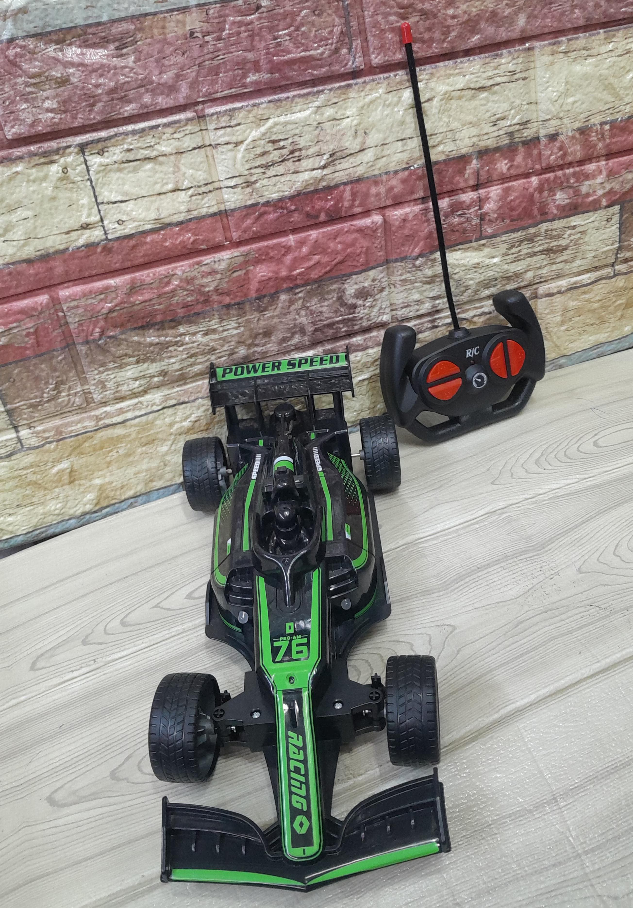 🚗💨  Pioneer Racing 💨🚗 Gift your kids with this toy. et ready to experience the ultimate in high-speed excitement with our cutting-edge remote control car! 🏁 Whether you're racing on the track or