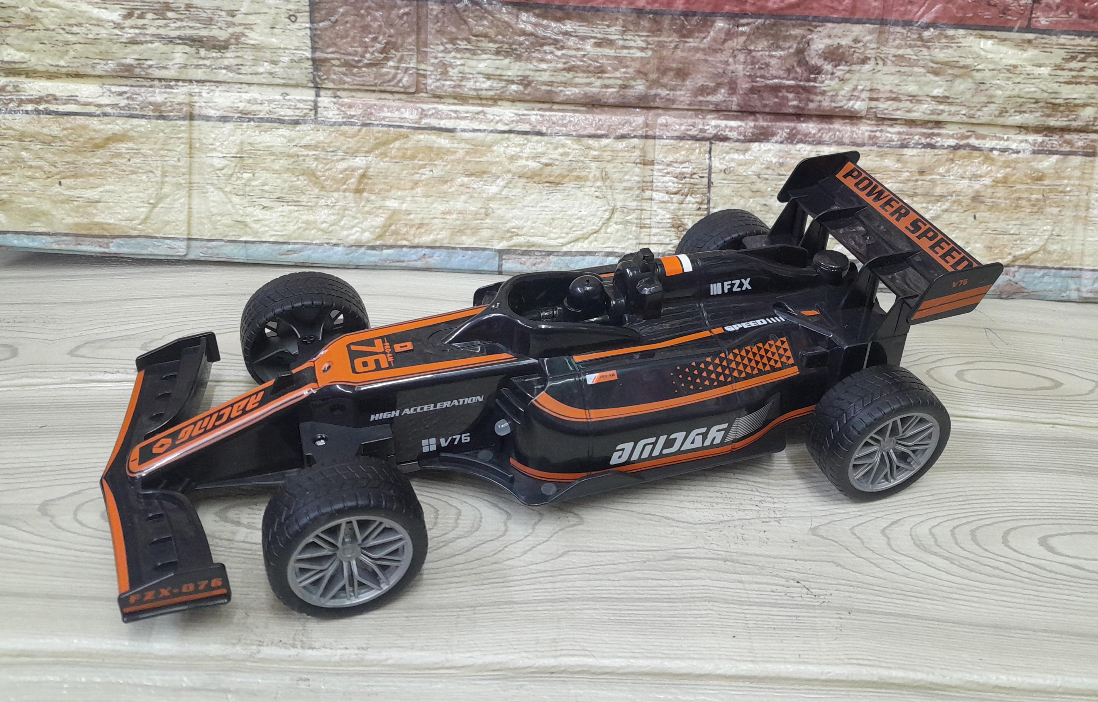 🚗💨  Pioneer Racing 💨🚗 Gift your kids with this toy. et ready to experience the ultimate in high-speed excitement with our cutting-edge remote control car! 🏁 Whether you're racing on the track or