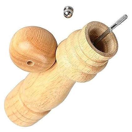 Pepper grinder small. . Crafted from high-quality wood, this sturdy grinder offers durability and style for any occasion. With a simple twist of the knob at the top