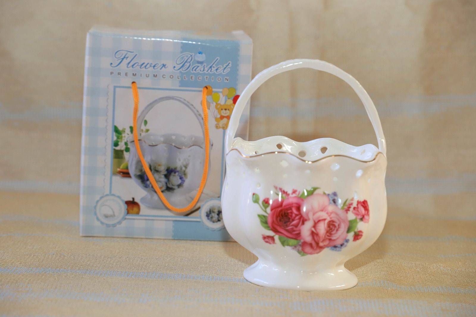 1pc bone china basket,this basket can be used as a home decor for flowers can also be used as a cutlery organiser.its made of high quality bone china which does not chip off even when used for years